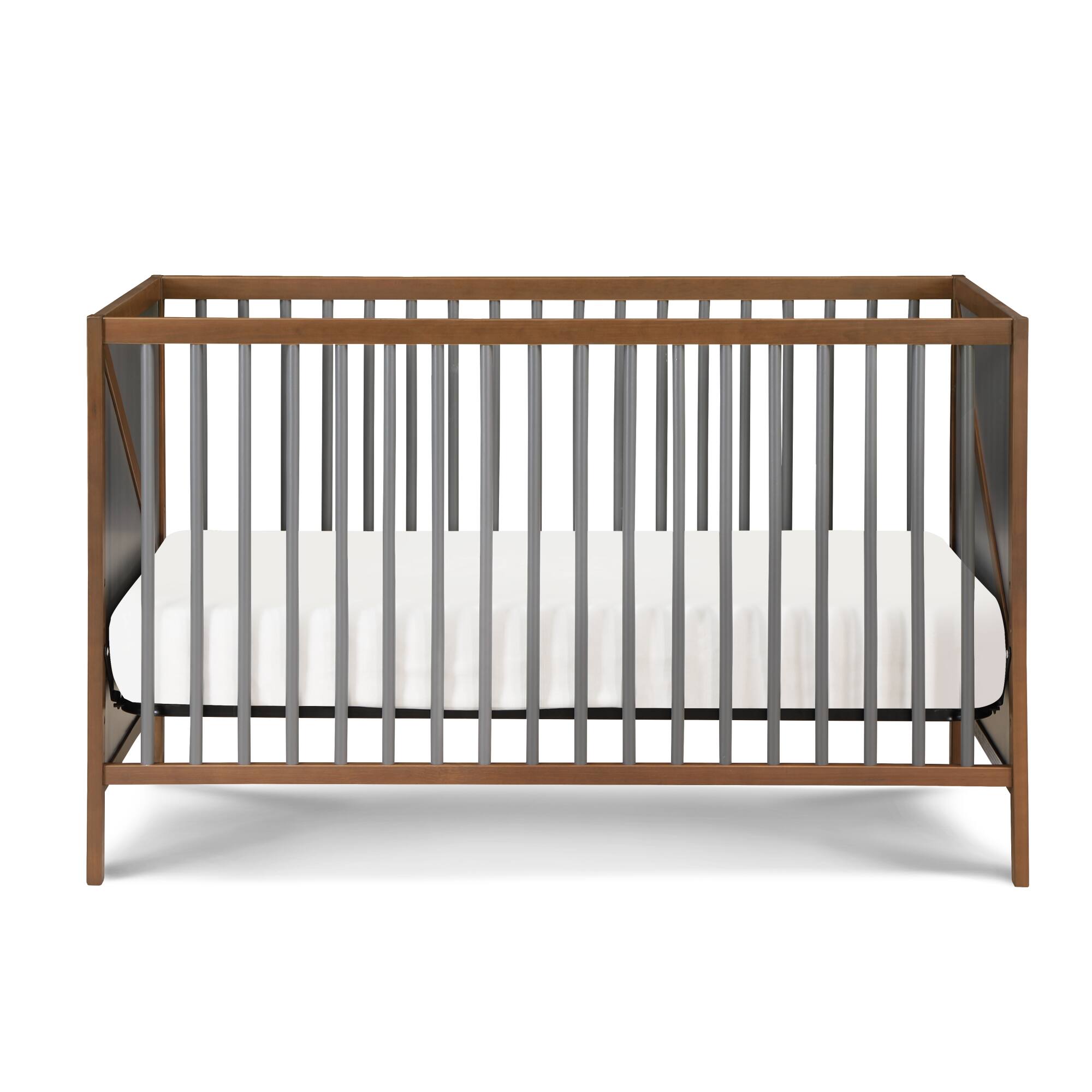 Left. GOODSILO - Convertible 3-in-1 Wooden Crib with Adjustable Mattress Heights and Mid-Century Modern Design - Walnut Brown.