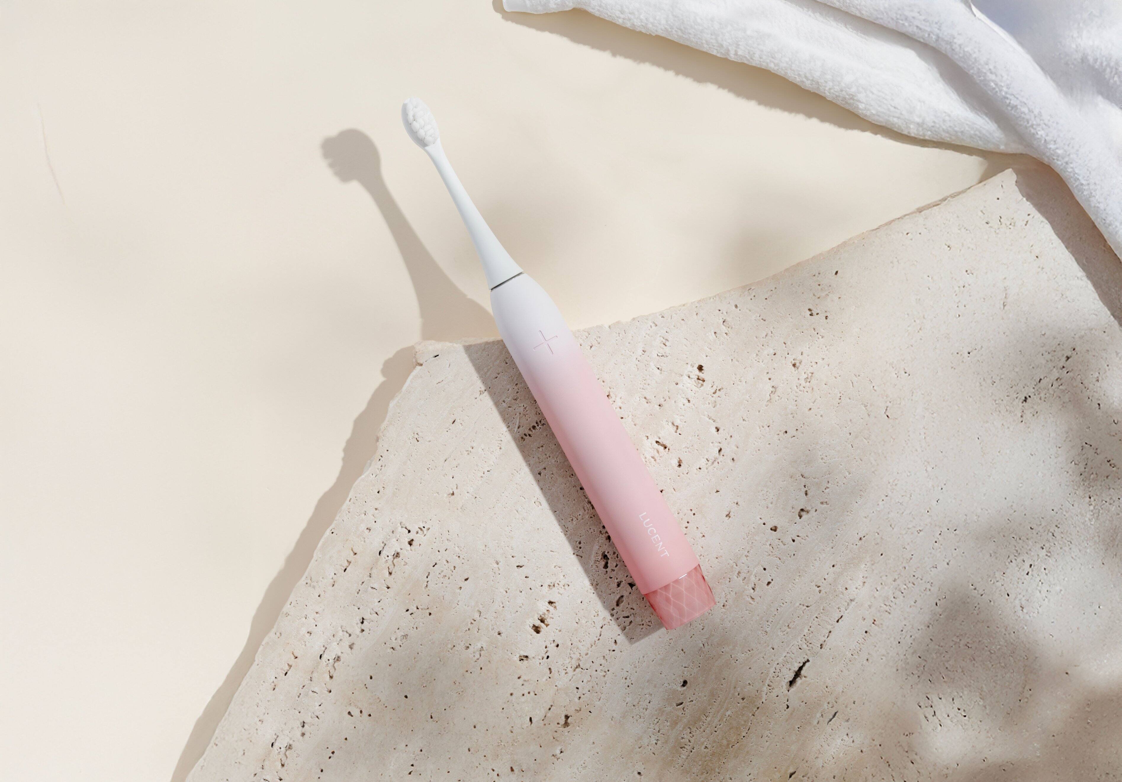 Left. Lucent - Prism Sonic Electric Toothbrush - Pink Bliss.