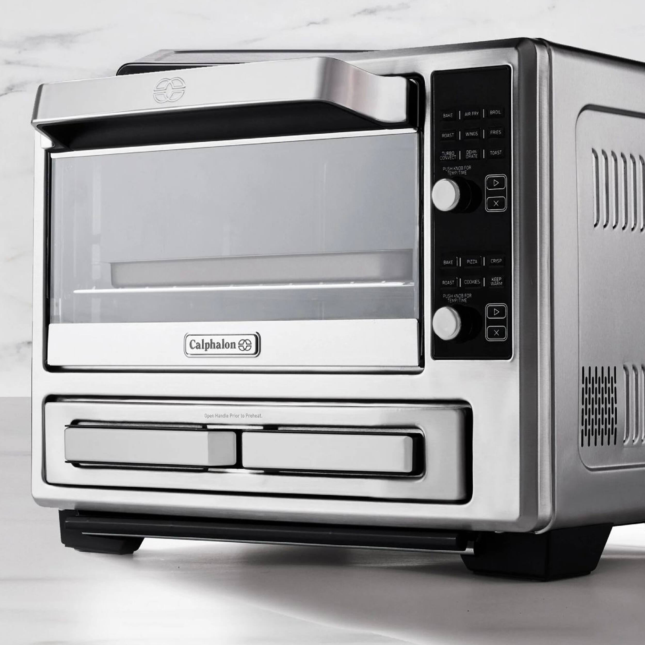 BAKE AIR FRY BROIL ROAST WINGS FRIES BAKE PUSH BUTTON FOR TEST TIME ROAST AND COOKS KEEP PUSH BUTTON FOR PREHEAT Open Hande Prior to Preheat