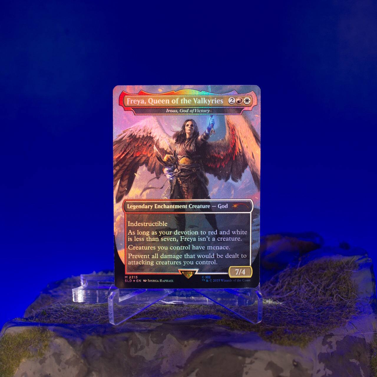 Freya, Queen of the Valkyries 2  
Iroas, God of Victory  
Legendary Enchantment Creature - God  
Indestructible  
As long as your devotion to red and white is less than seven, Freya isn't a creature. Creatures you control have menace. Prevent all damage that would be dealt to attacking creatures you control.  
7/4  
N  
2215  
C  
SIE  
SLD  
4  
EN  
losmua  
RAPHAEL  
TV &  
2025  
Wizards the Coast