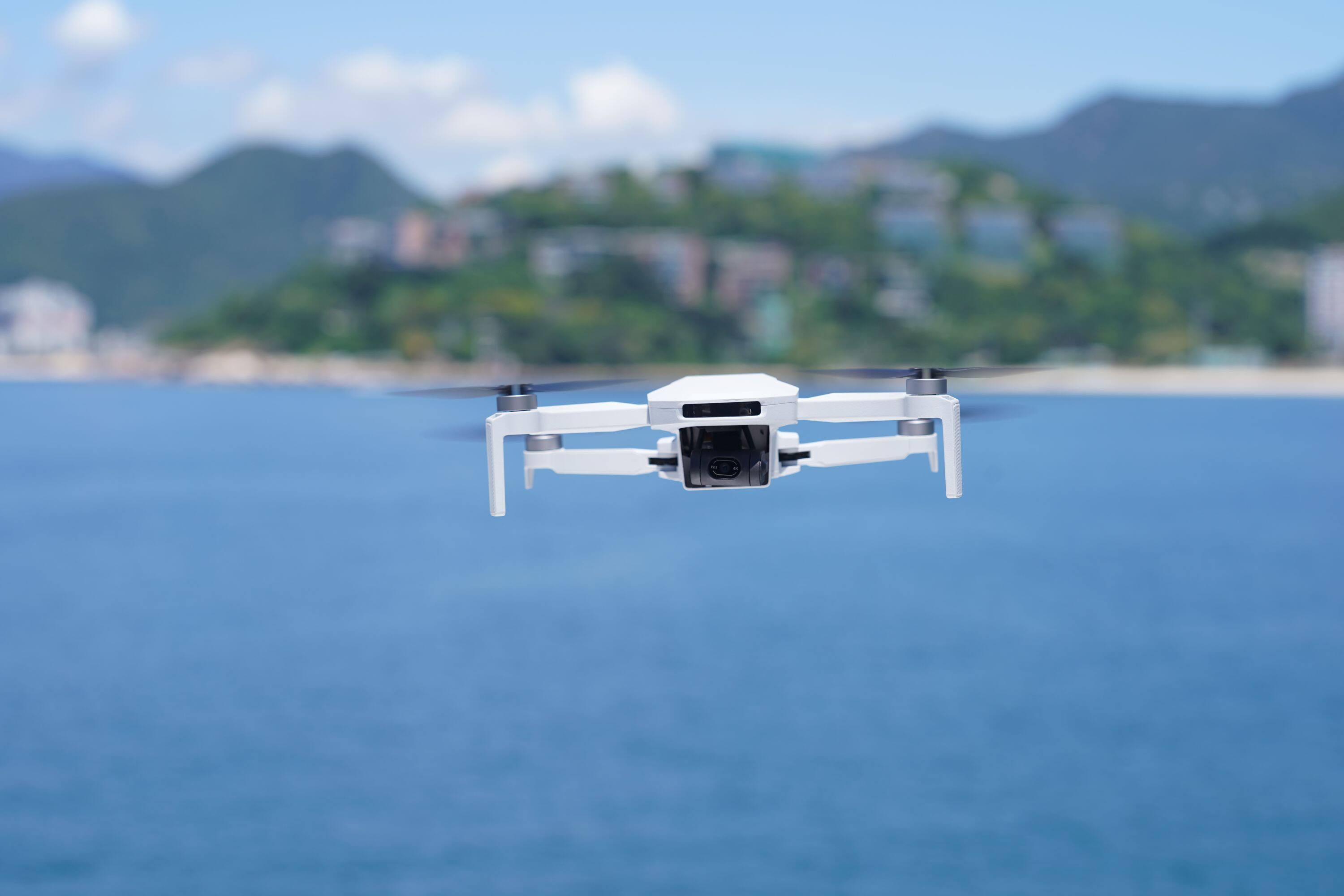 Left. Potensic - ATOM Fly More Combo Drone with Remote Controller - Grey.