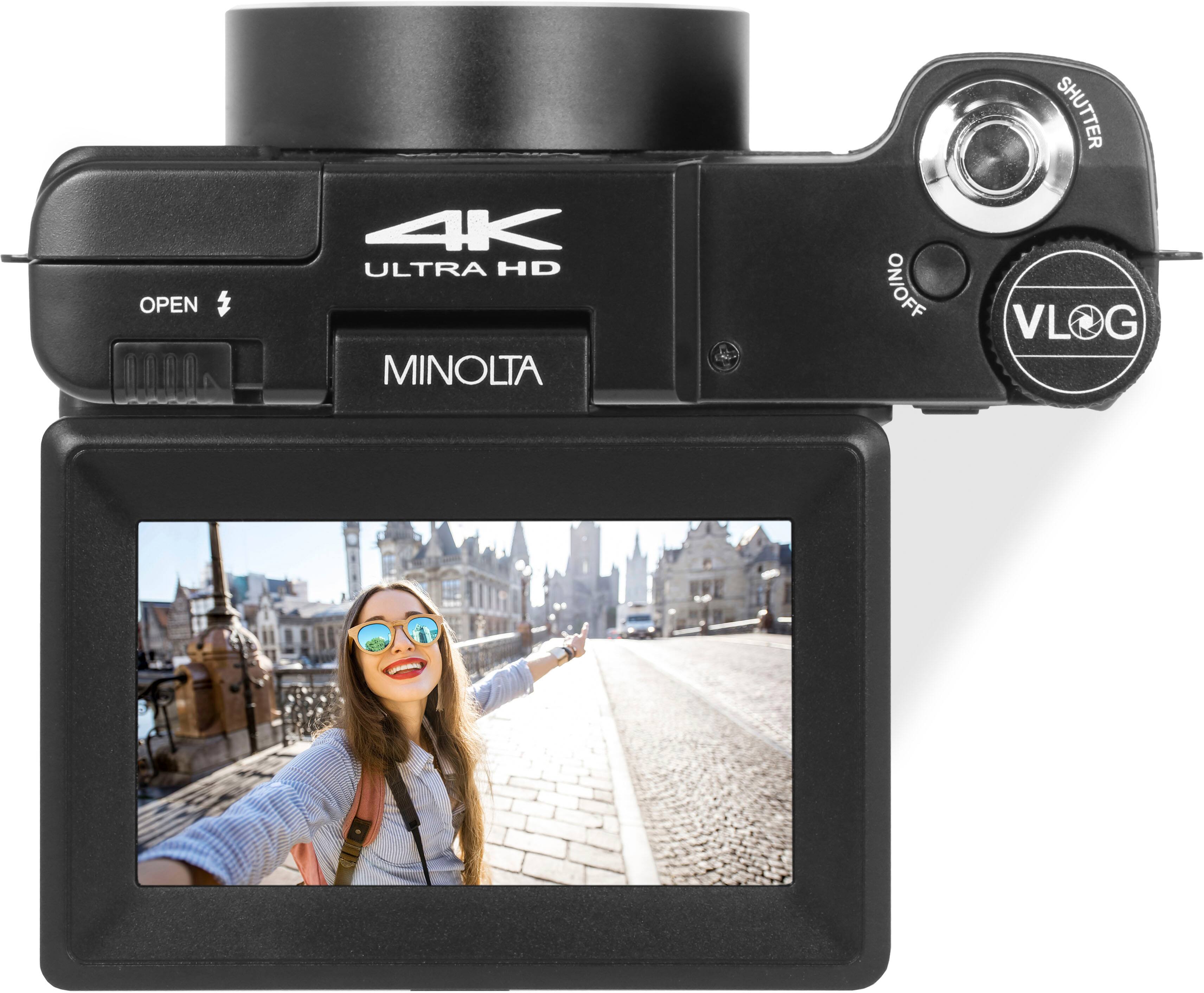 The text on the image reads "OPEN 4K ULTRA HD MINOLTA ON/OFF SHUTTER VL G."