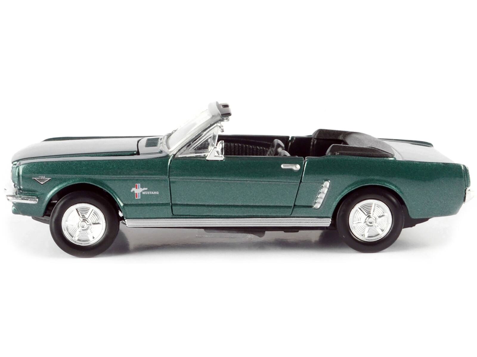 Left. Motormax - 1964 1/2 Ford Mustang Convertible Green Metallic 1/24 Diecast Model Car by Motormax - Green.