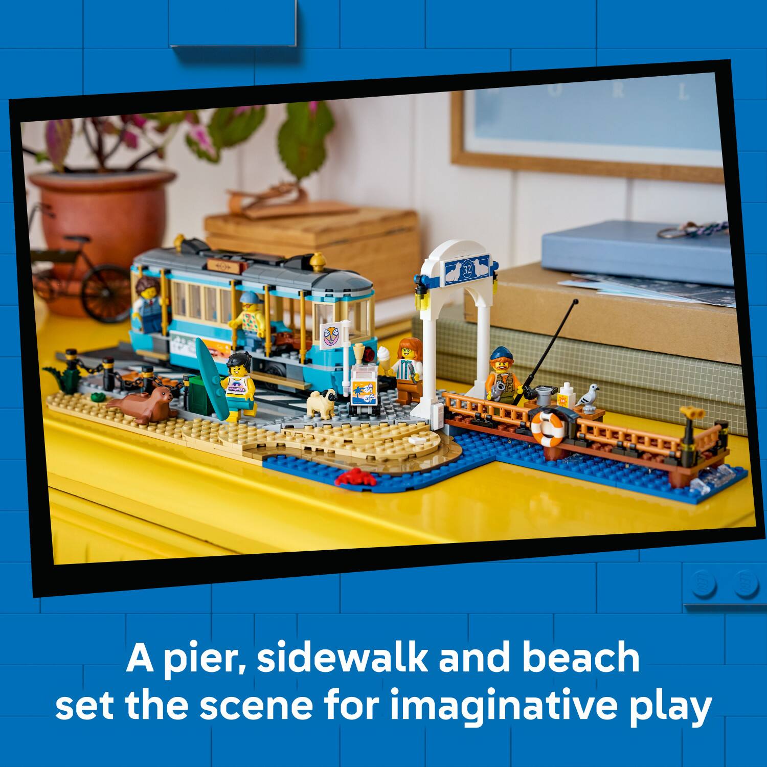 A pier, sidewalk and beach set the scene for imaginative play