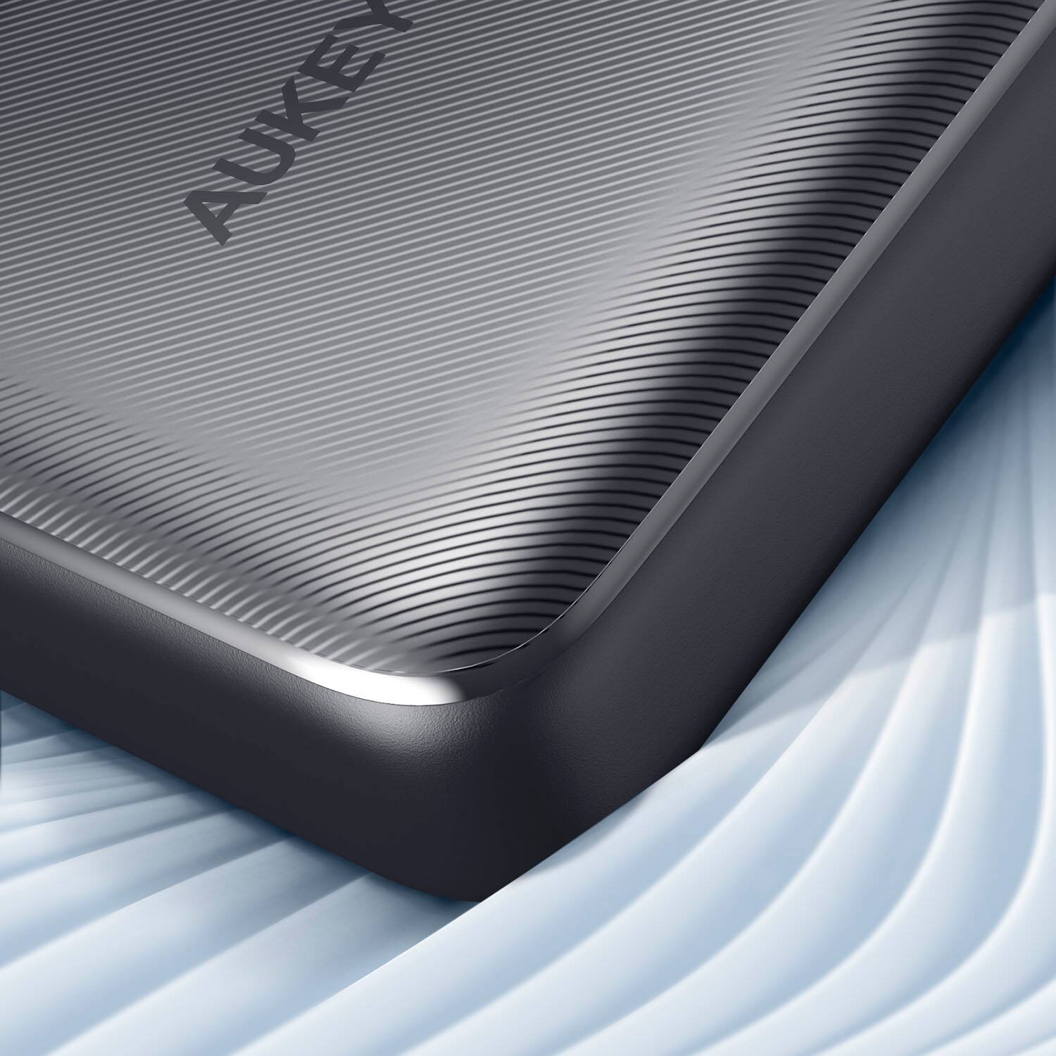 Angle. Aukey - Basix Plus | 20,000mAh 22.5W Portable Power Bank - Grey.