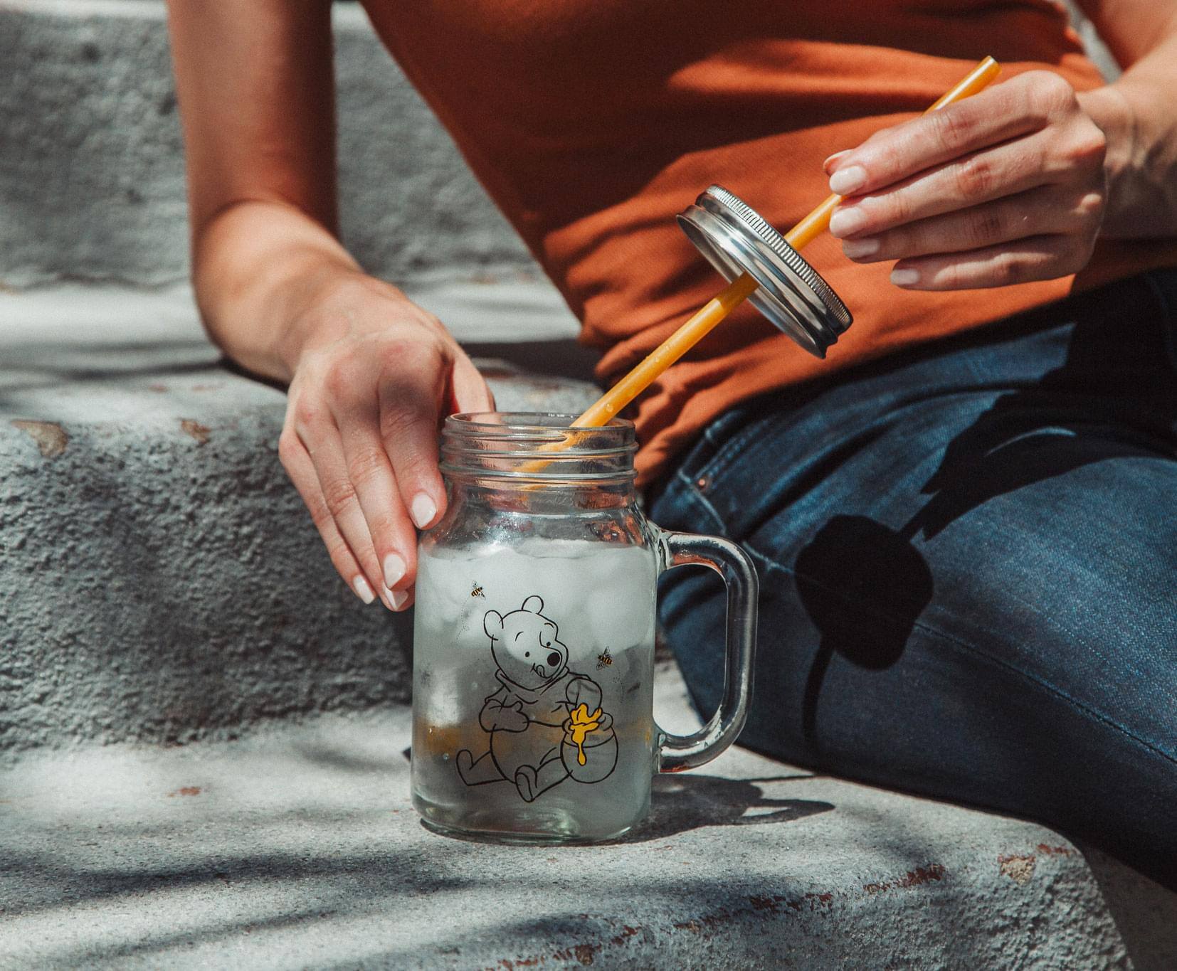 Alt View 10. Disney - Winnie the Pooh Sweet as Can Bee 21 Ounce Glass Mason Jar With Lid and Straw - Yellow.