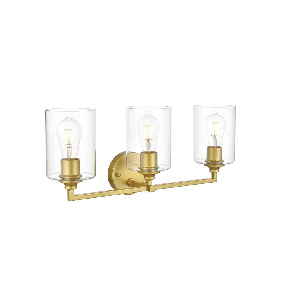 Back. Living District - Mayson 3 light Brass and Clear Bath Sconce - Brass And Clear.
