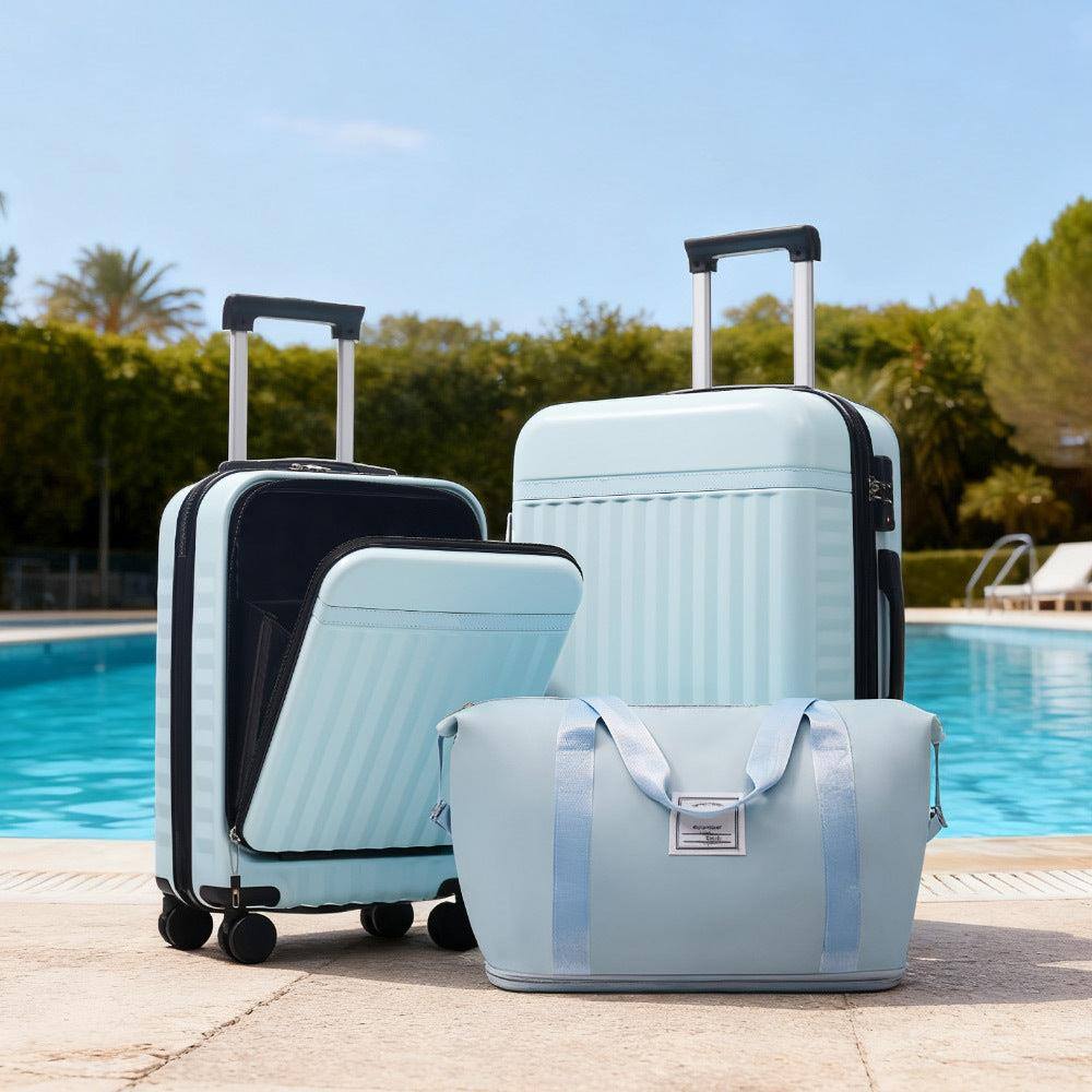 Angle. BreeBe - 3-Piece Front-Opening Hardshell Luggage Set, Carry-On Suitcases with USB Port, Expandable, Spinner Wheels, TSA Lock - Light Blue.