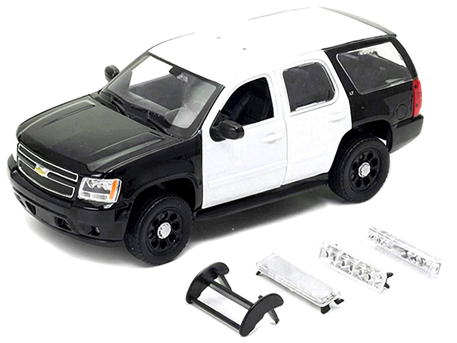 Angle. Welly - 2008 Chevrolet Tahoe Unmarked Police Car Black and White 1/24 Diecast Model Car by Welly - Black and White.