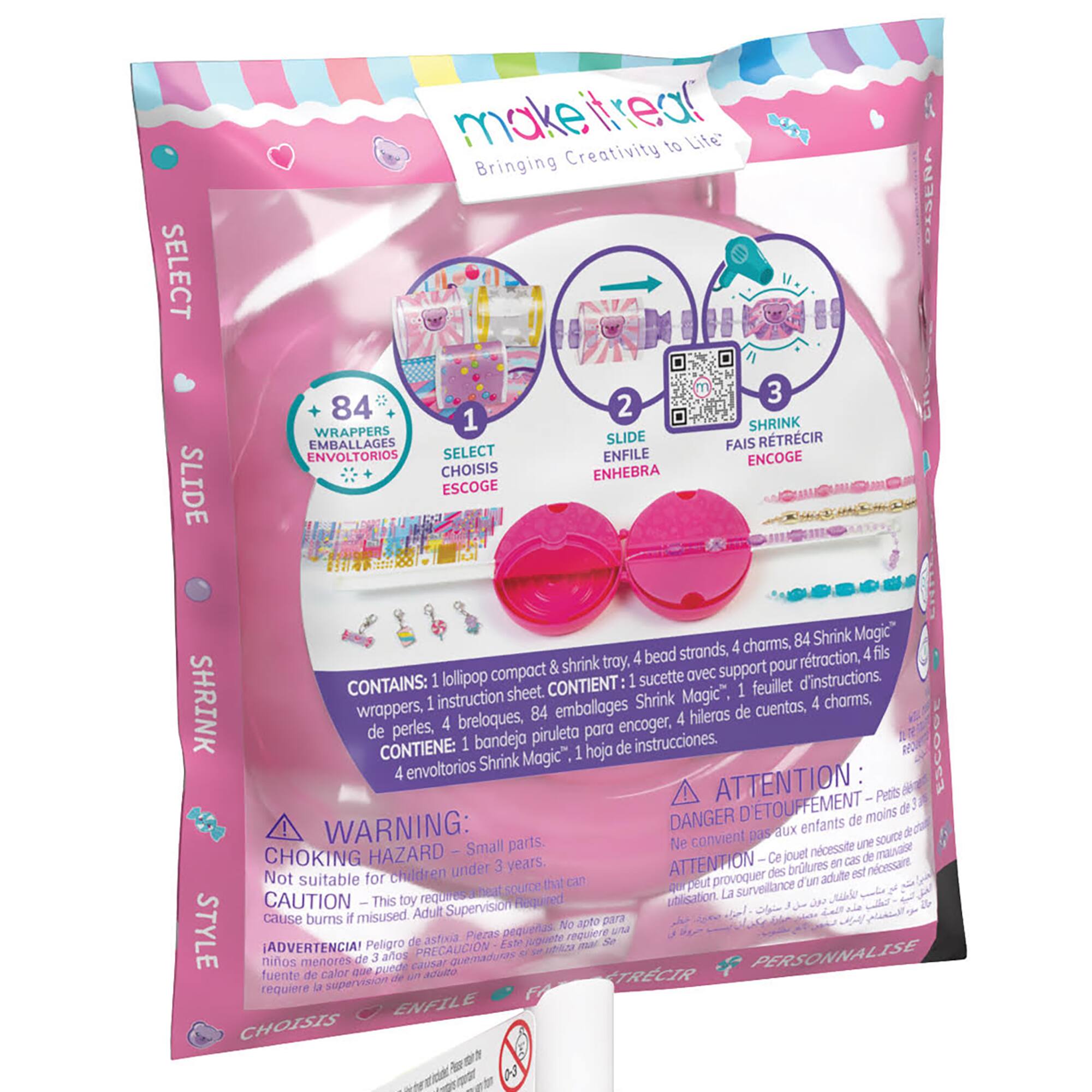 The image features a pink package with a warning label on it, indicating that it contains small parts and is not suitable for children under the age of three. The package is filled with crafting supplies, including charms, shrink wrappers, and shrink embellages. The package also contains a lollipop and a sheet of instructions. The warning label emphasizes the importance of adult supervision when using the contents of the package to ensure the safety of young children.