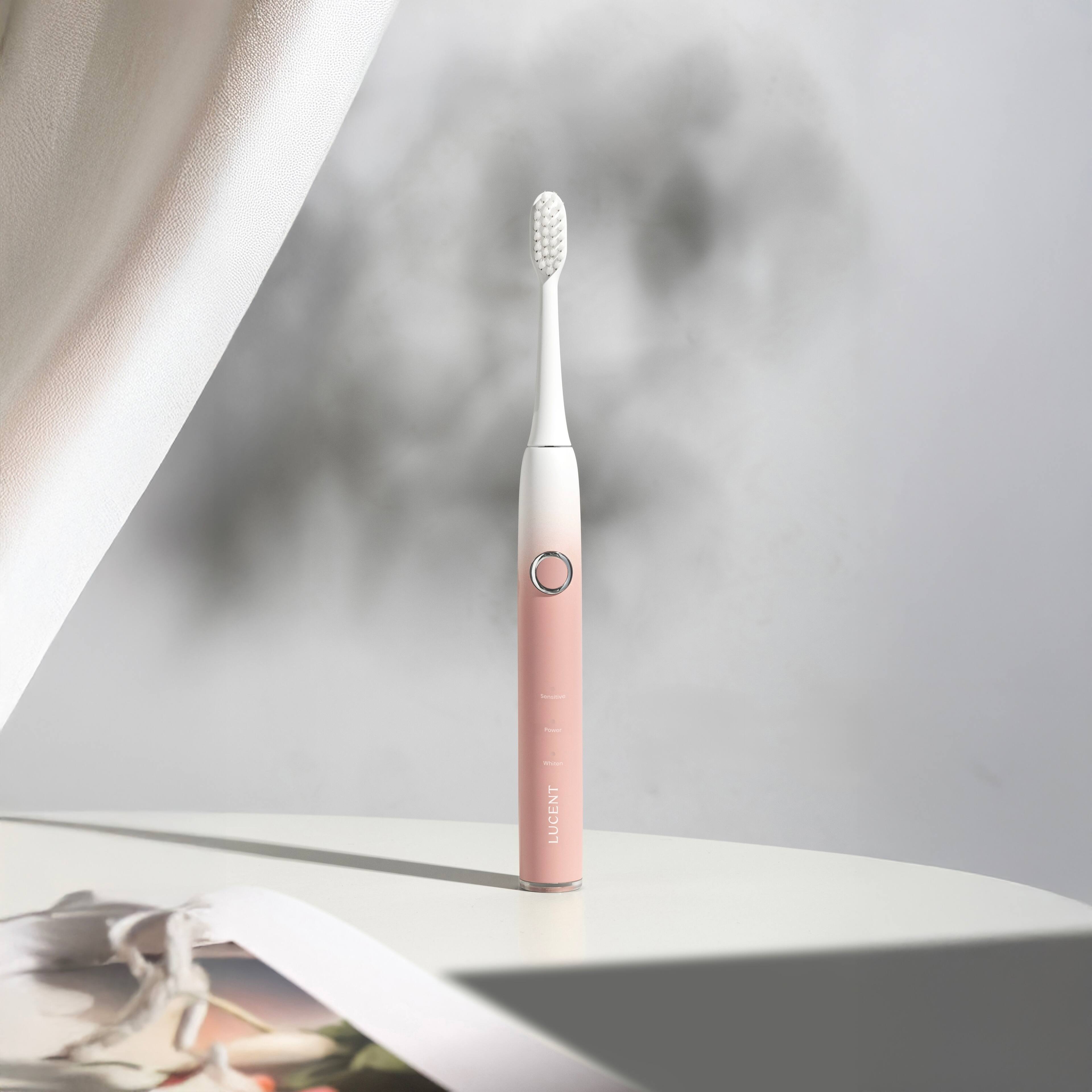 Left. Lucent - Spark Sonic Electric Toothbrush - Pink Bliss.