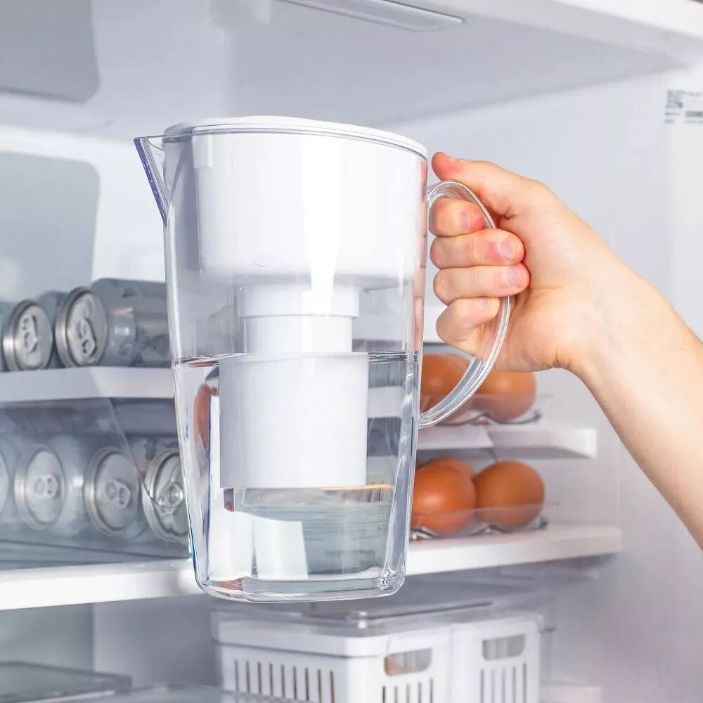 Left. OU - OU Water Filtration Pitcher, Filters Chlorine & Mercury, Water Purifier Pitcher Dispenser.