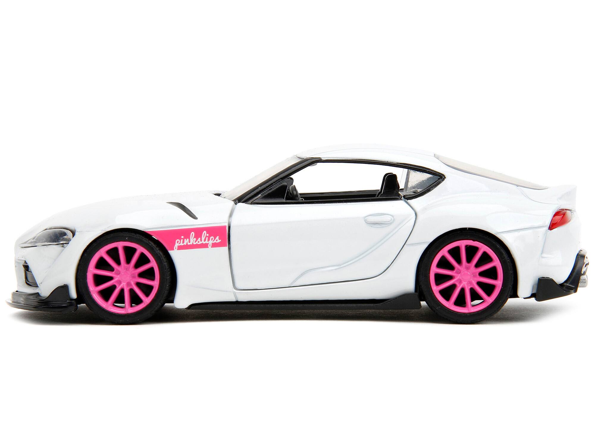 Left. Jada - 2020 Toyota Supra White Metallic with Pink Wheels "Pink Slips" Series 1/32 Diecast Model Car by Jada - White Metallic With Pink.