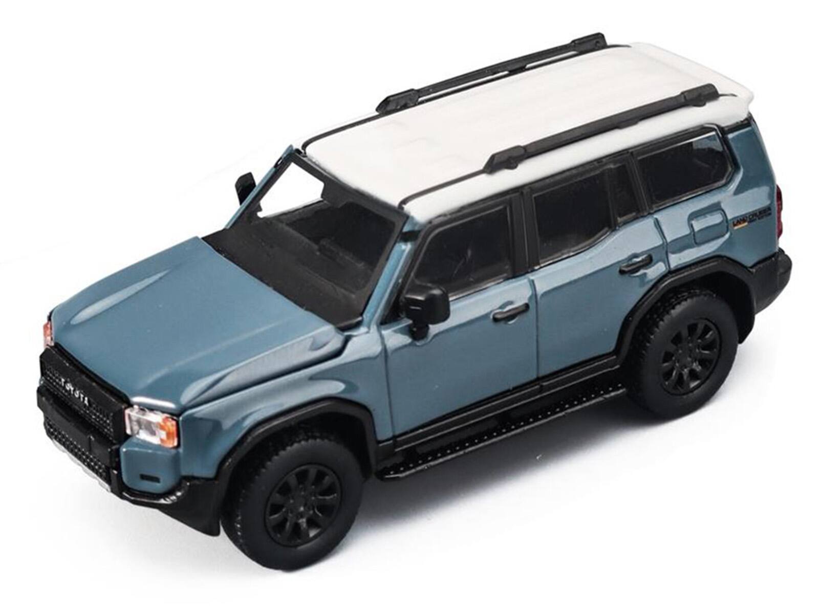 Alt View 1. Trends Hobby - Toyota Land Cruiser 250 Blue with White Top 1/64 Diecast Model Car by Trends Hobby.