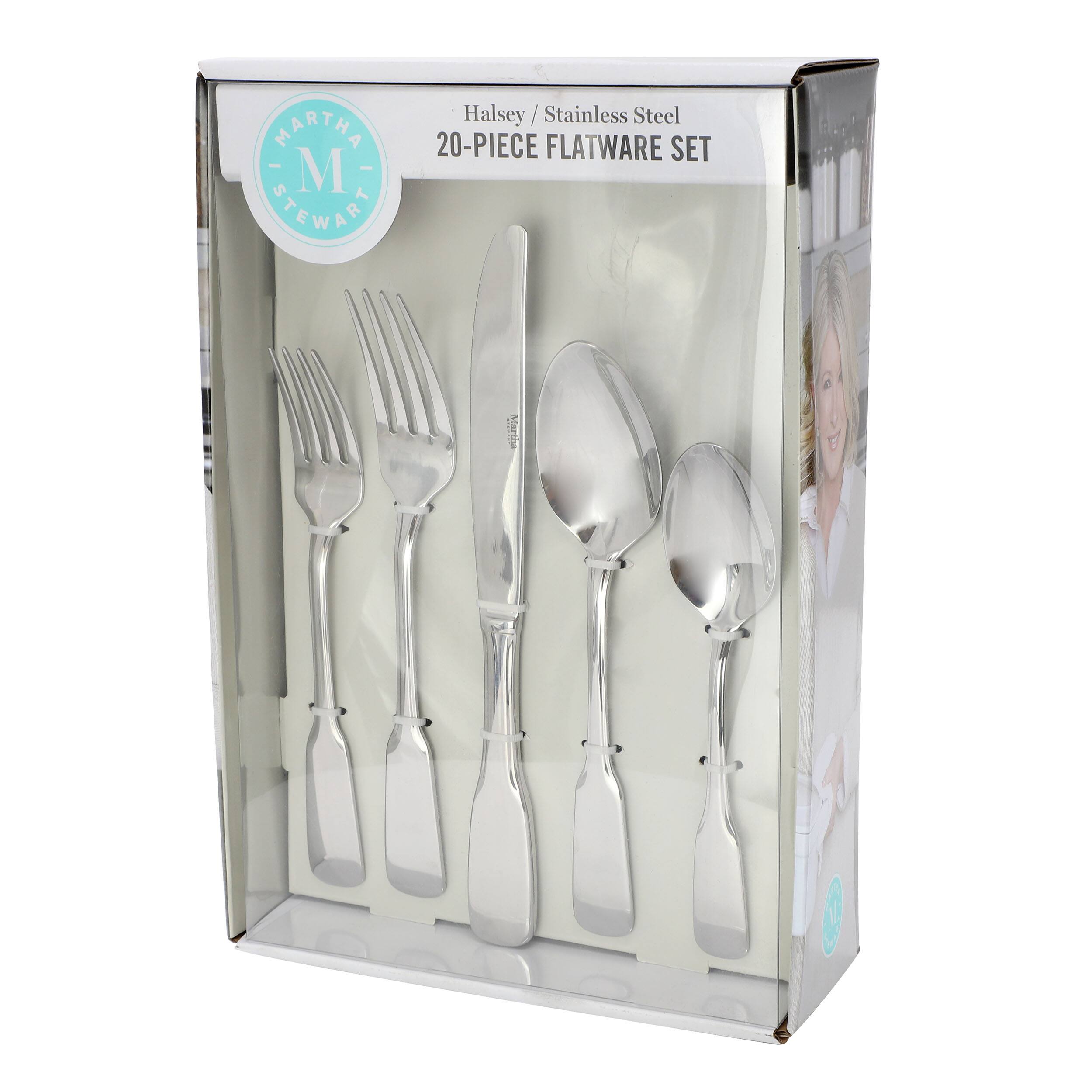 The image shows a 20-piece flatware set made of stainless steel, designed by Martha Stewart. The set includes a fork, knife, and spoon, all made of high-quality stainless steel. The flatware is arranged in a box, making it a convenient and elegant gift option.