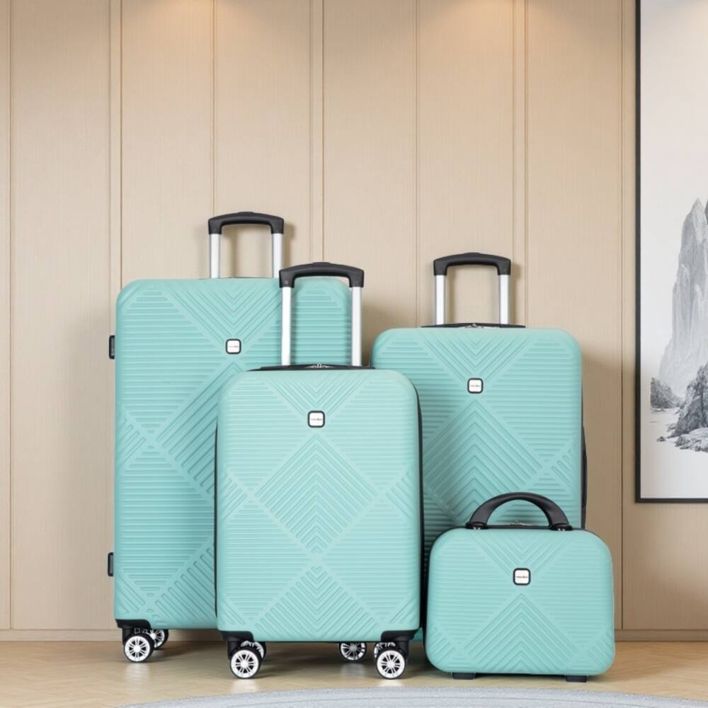 Angle. BreeBe - Lightweight 4-Piece ABS Suitcase Set with Makeup Box and Aircraft Wheels - Light Blue.