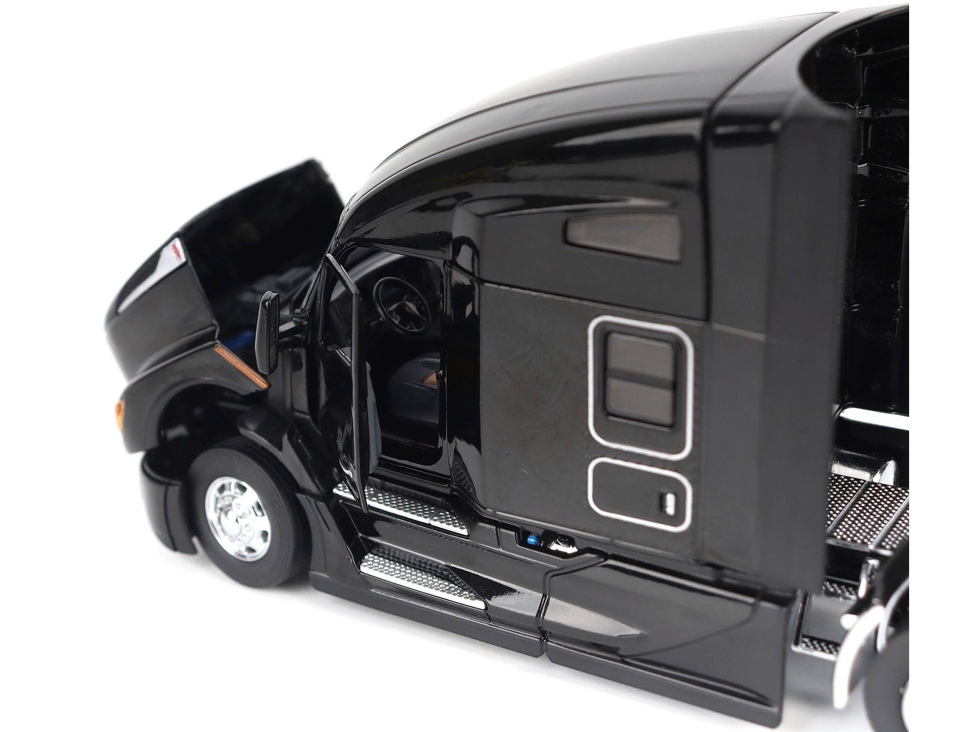 Angle. Diecast Masters - Kenworth T680 76" High Roof Sleeper Cab Truck Tractor Black "Transport Series" 1/50 Diecast Model by Diecast Masters - Black.
