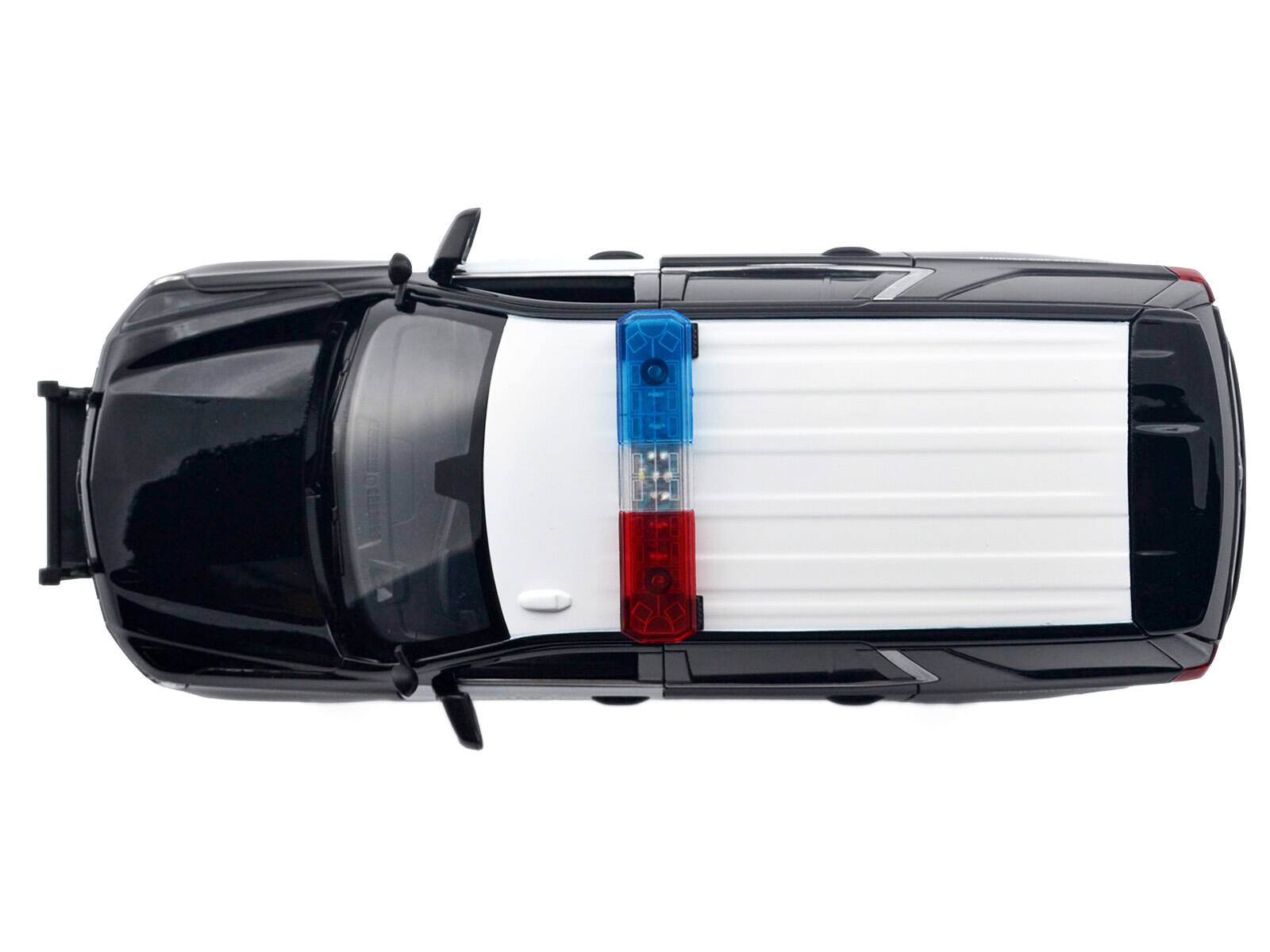 Alt View 4. Motormax - 2025 Chevrolet Tahoe PPV "CHP" Black and White with Light Bar and Lights and Sounds 1/24 Diecast Model Car by Motormax.