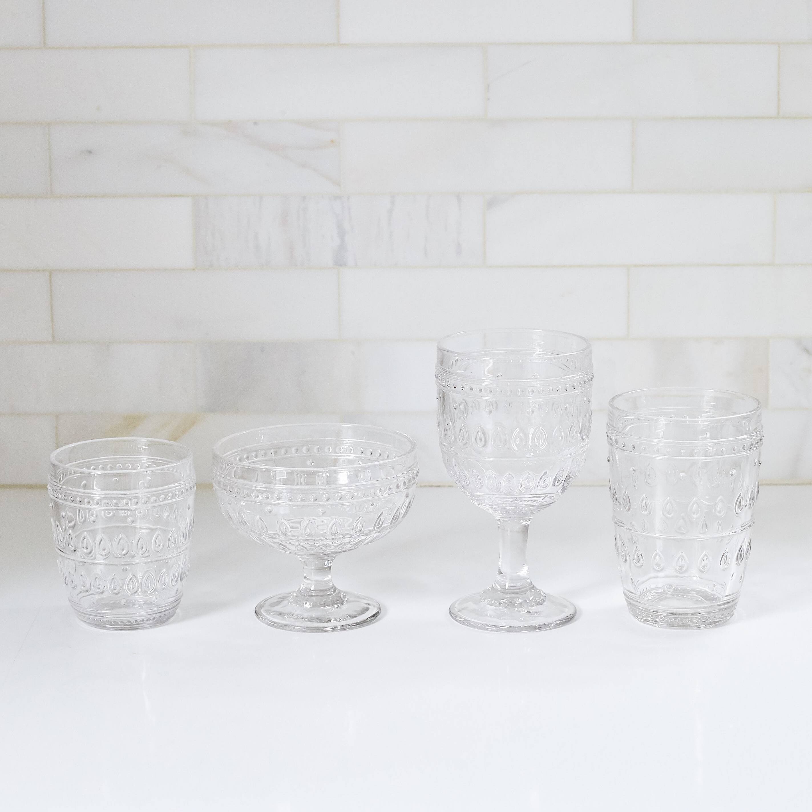 Left. Euro Ceramica Home - Fez Glassware 4 Piece 14oz Highball Glass Set in Clear - Clear.