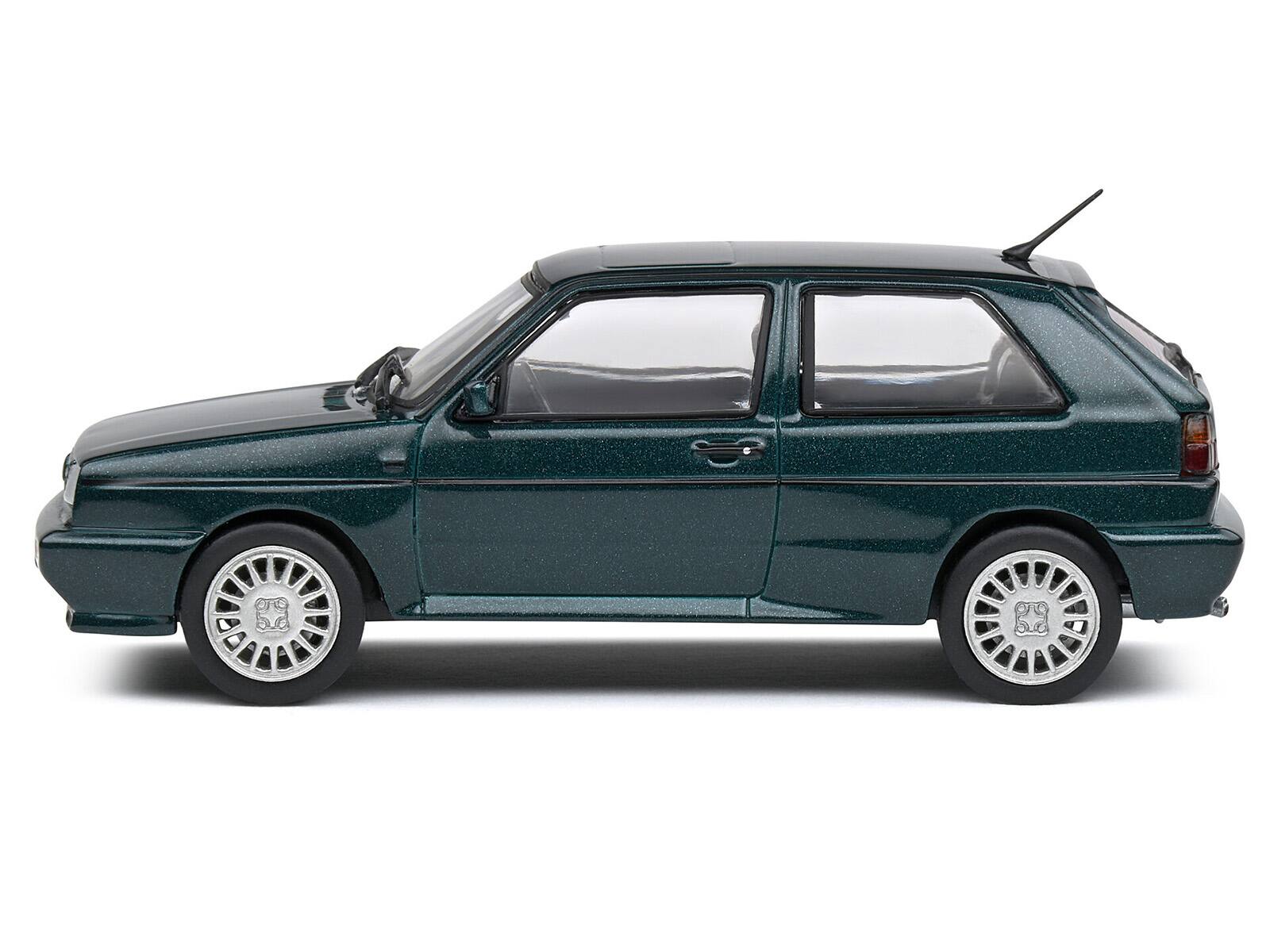 Angle. Solido - 1989 Volkswagen Golf Rallye G60 Green Metallic 1/43 Diecast Model Car by Solido - Green Metallic.