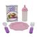 The image features a pink plate, a fork, and a spoon, all placed on a table. The plate is part of a baby alive set, which includes a baby bottle and a bowl. The baby alive set is designed to encourage imaginative play and role-playing in children. The pink plate, fork, and spoon are all made of plastic and are safe for children to use during their playtime.