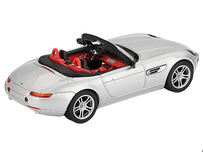 Left. Mini GT - BMW Z8 Roadster Silver Metallic with Red and Black Interior Limited Edition 1/64 Diecast Model Car by Mini GT - Silver Metallic with Red and Black.