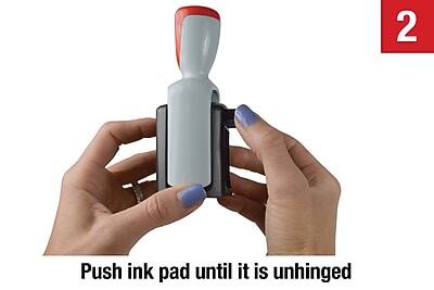 Push ink pad until it is unhinged