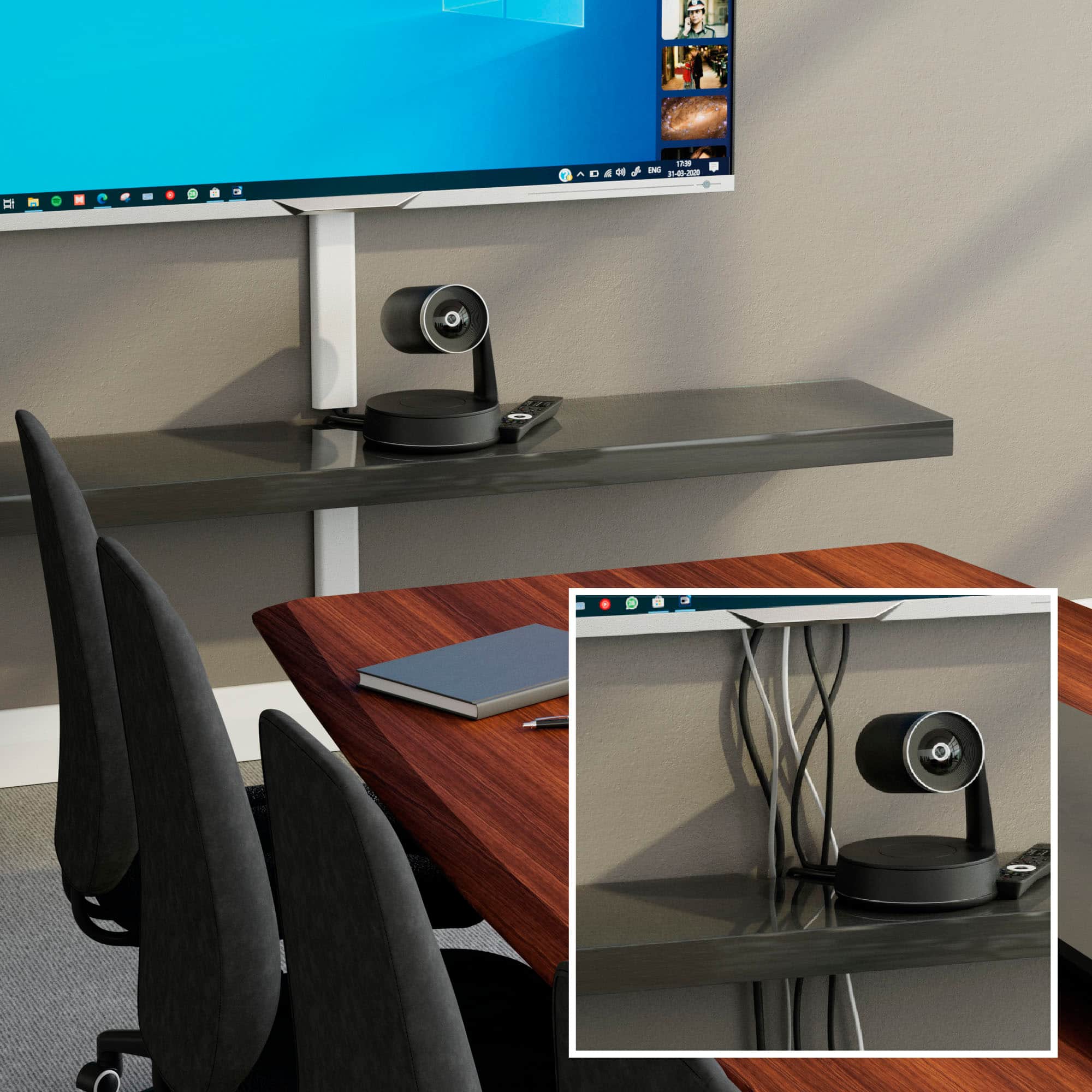 The DAJ-1 FEA is a webcam that is mounted on a wooden desk.