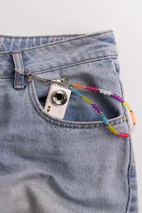 Front. Posh Tech - Mini Digital Camera with Beaded Lanyard.