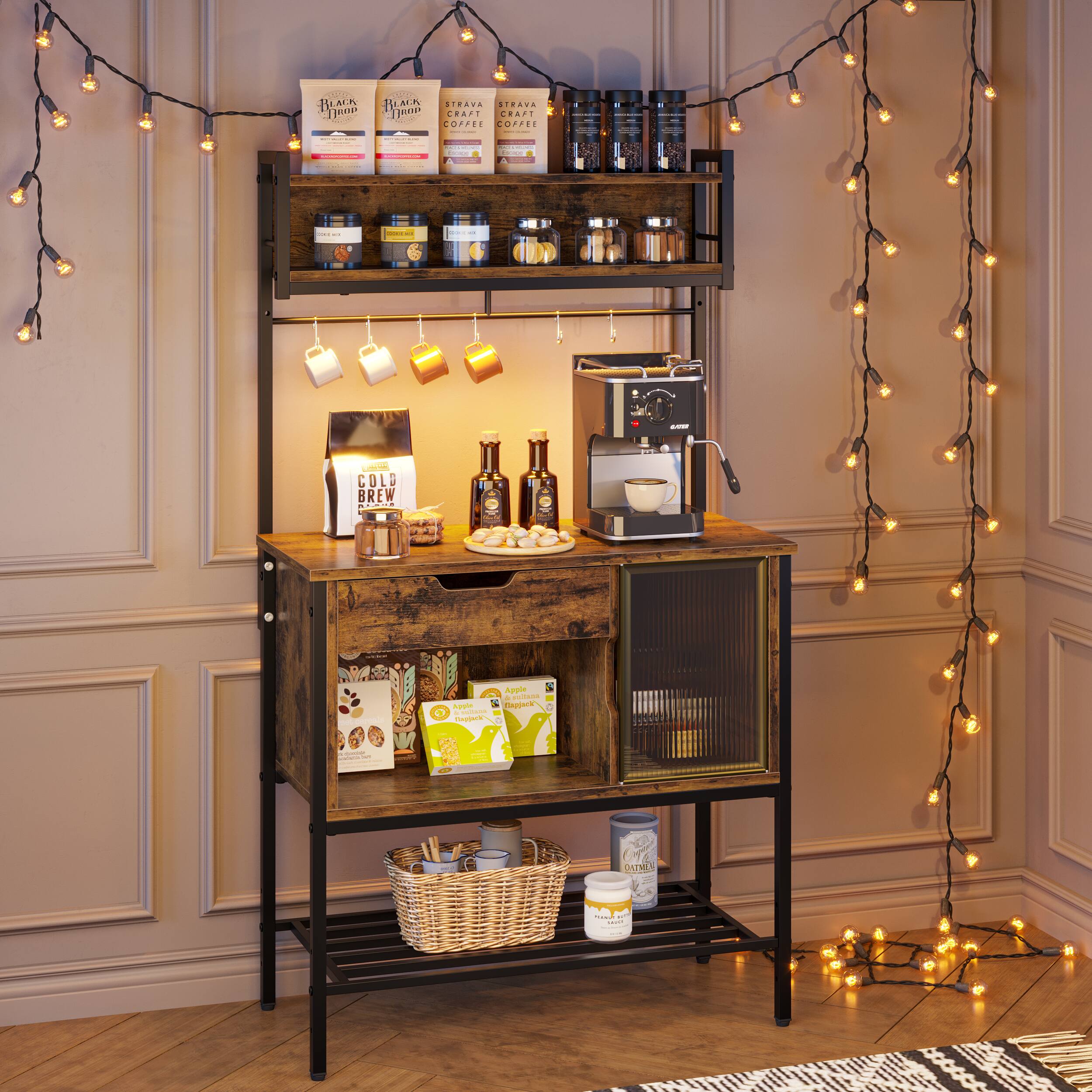 Sure, here is the corrected and grouped text from the image:

---

**Top Shelf:**
- BLACK DROP CRAFT COFFEE
- STRAIGHT CRAFT COFFEE

**Middle Shelf:**
- COLD BREW

**Bottom Shelf:**
- Apple Maple Syrup
- OATMEAL

**Additional Items:**
- Various jars and containers with labels (not fully legible)
- Coffee machine
- String lights

--- 

This text is based on the visible labels and items in the image.