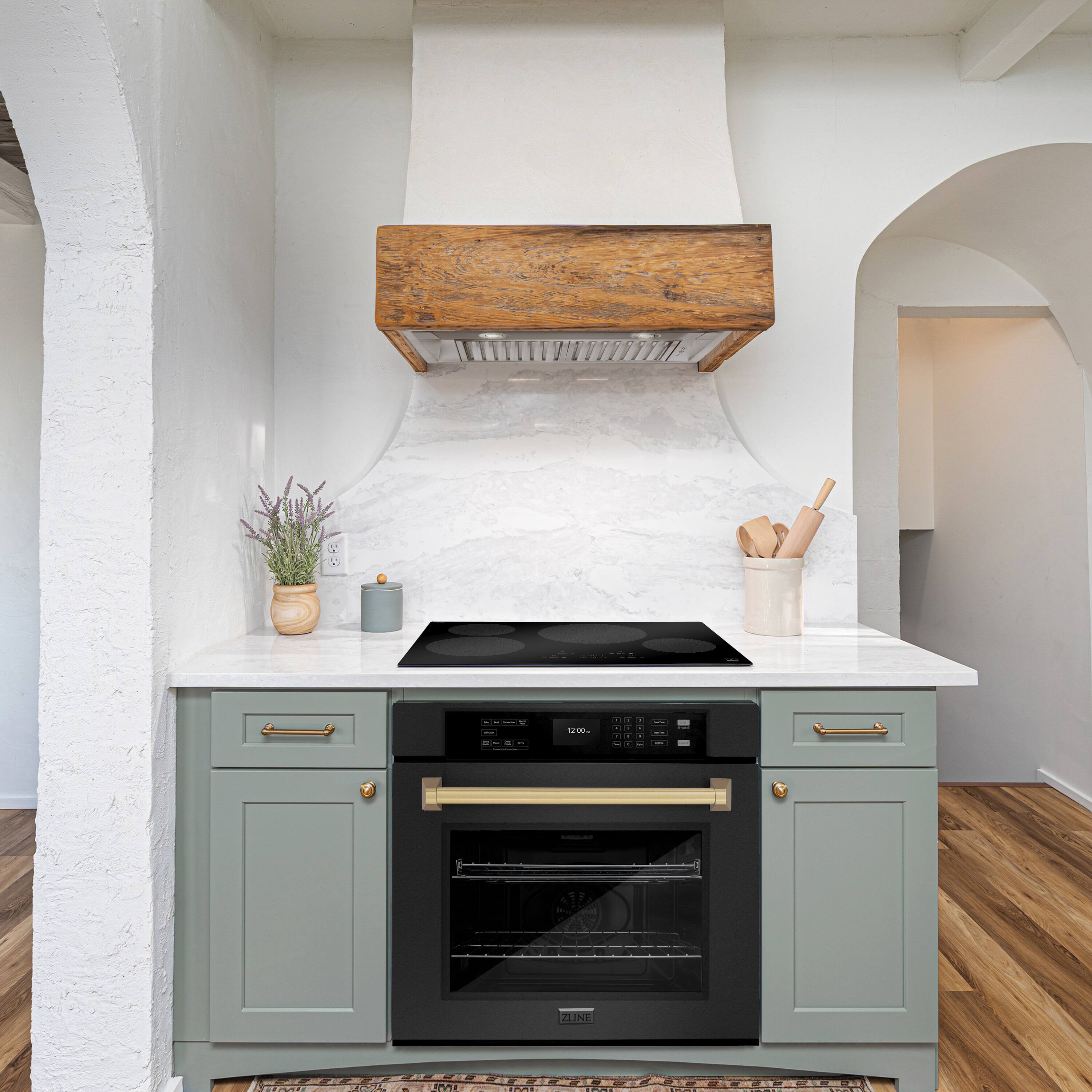 The image features a kitchen with a stove top oven and a hood above it. The oven is positioned under a cabinet, and there is a potted plant on the countertop. Additionally, there are several wooden spoons placed nearby. The kitchen appears to be well-equipped and ready for cooking.