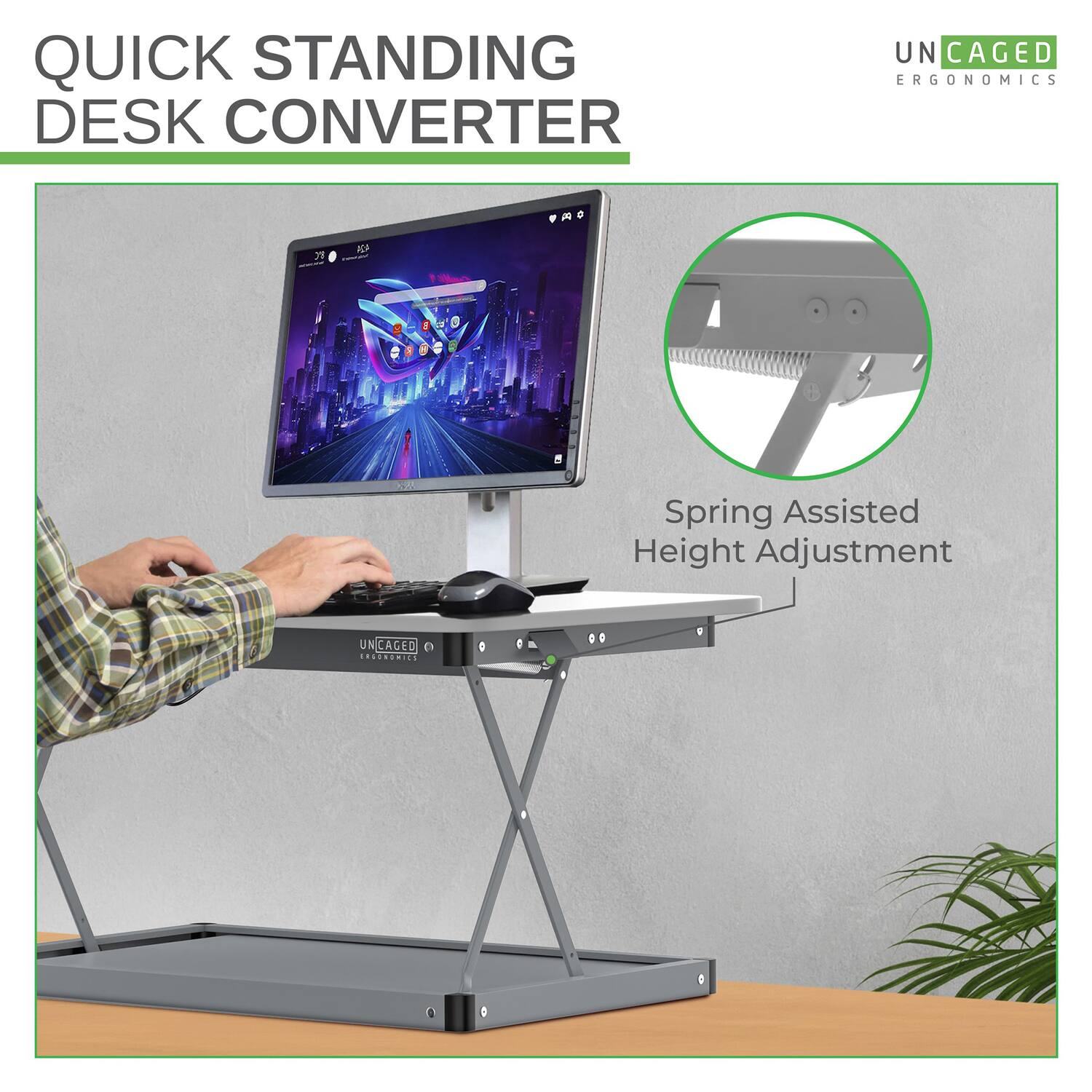 QUICK STANDING DESK CONVERTER  
UN CAGED ERGONOMICS  
Spring Assisted Height Adjustment