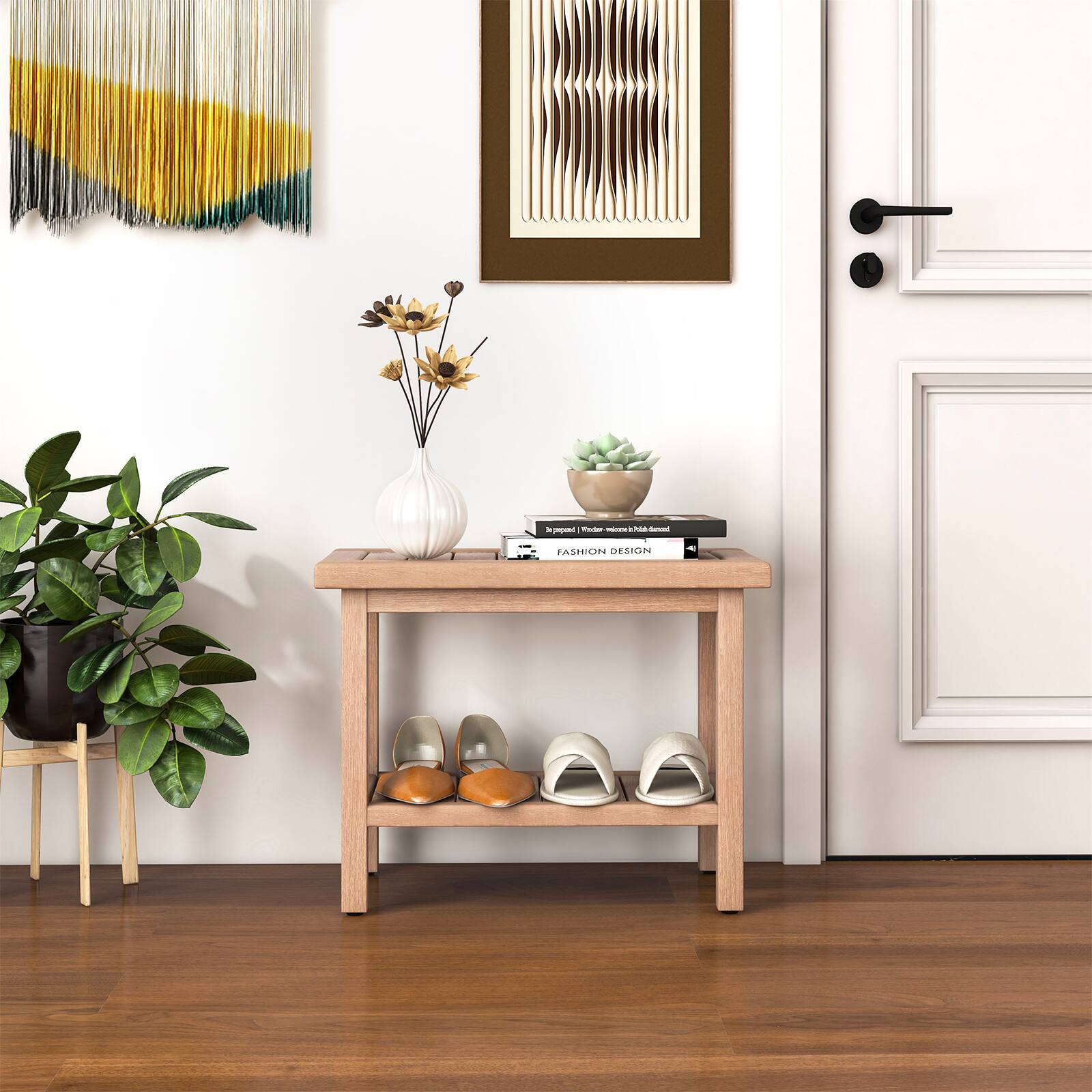 "Ashicine Design" is a company that specializes in creating unique and stylish home decor items, such as the wooden table with a vase of flowers and a pair of shoes on it. The table is placed near a doorway, and there are also books and a potted plant nearby. The combination of these elements creates a cozy and inviting atmosphere in the space.