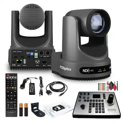 Sure, here is the corrected and grouped text from the image:
**Main Device:**
- LINE IN LINE OUT
- SYSTEM SELECT
- RS485
- RS232 IN OUT
- DC 12V
- NDI K22
- USB 2.0
- 3G-SDI
- HDMI
- RESTOR
**Camera:**
- PTZOptics
- NDI|HX
- STANDBY POWER
**Remote Control:**
- SYSTEM SELECT
- 1 2 3
- 4 5 6
- 7 8 9
- 0
- POWER
- MENU
- RESET
- HOME
- MENU
- SLOW ZOOM FAST
- UP
- DOWN
- LEFT
- RIGHT
- IR CUT
- BACKLIGHT
- RGB
- WHITE BALANCE
- FOCUS
- PANTILT
- PTZ
- OPTICS
**Accessories:**
- USB Cable
- Power Adapter
- HDMI Cable
- SDI Cable
- Batteries
- Screws
- Screws
- Screws
- Screws
- Screws
- Screws
-