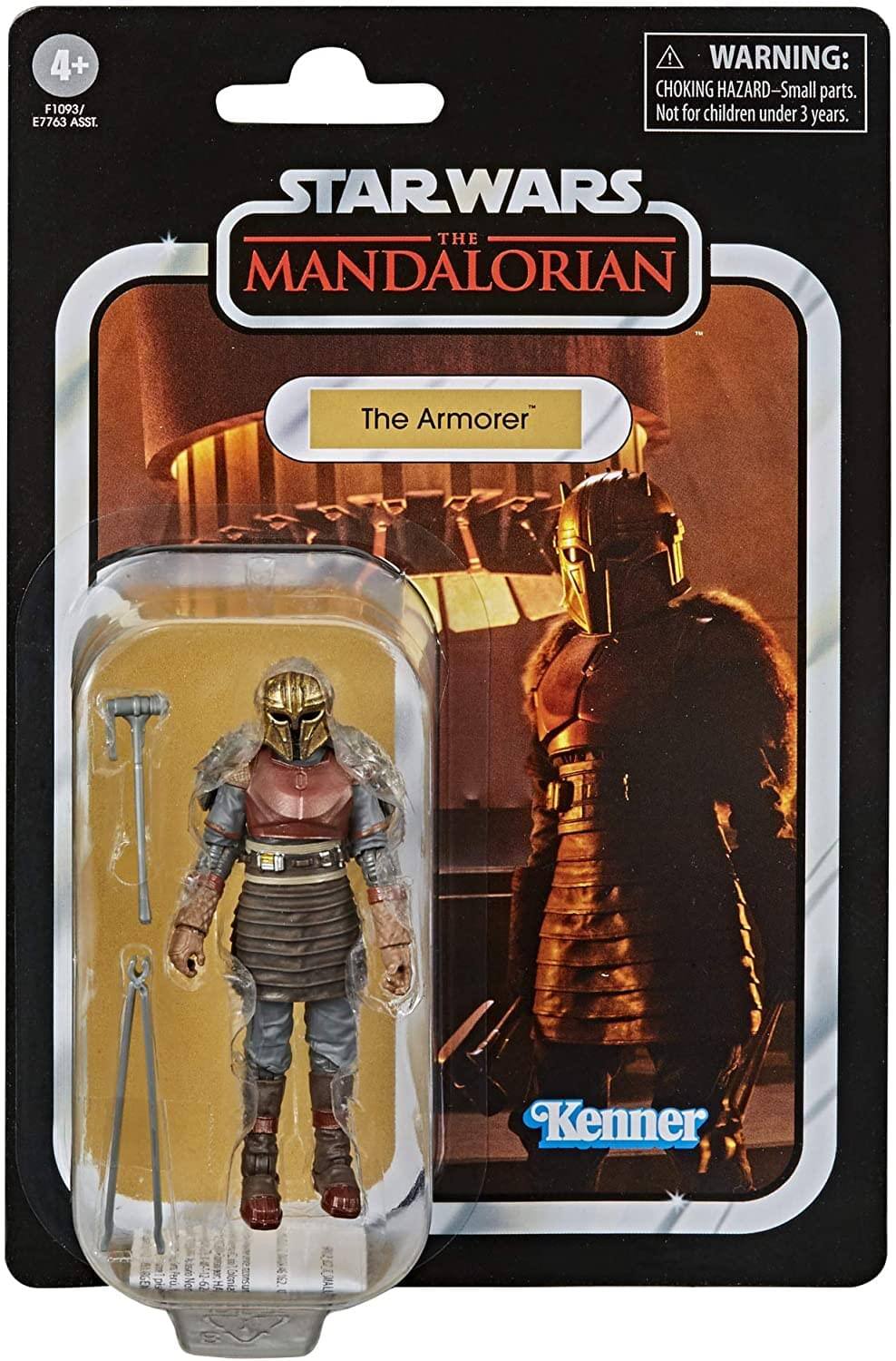 4+  
F1093 / E7763 ASST.  

WARNING: CHOKING HAZARD—Small parts. Not for children under 3 years.  

STAR WARS THE MANDALORIAN  
The Armorer  

Kenner