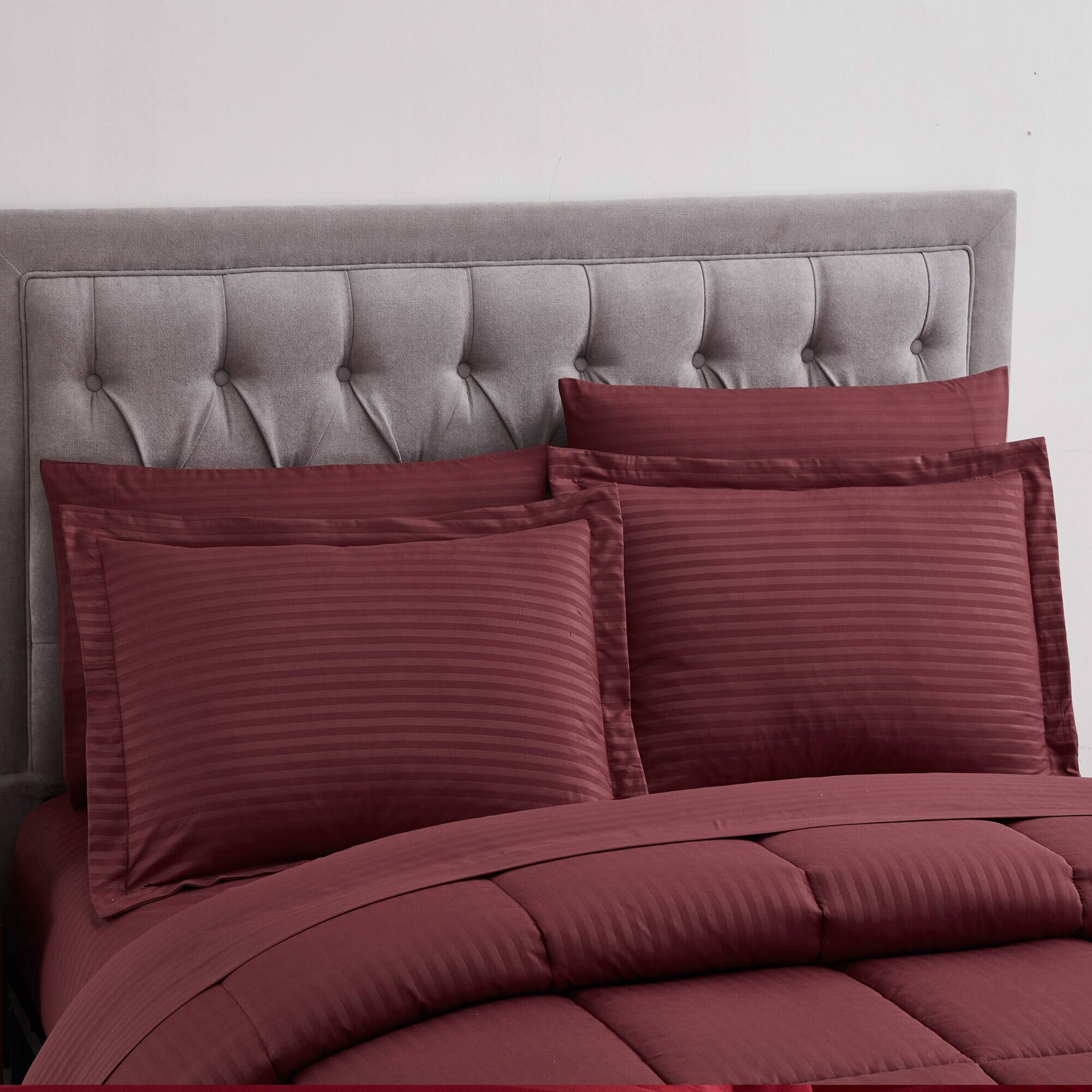 Angle. Sweet Home Collection - 8 Piece Embossed Dobby Stripe Bed in a Bag All Season Complete Set with Sheets - Queen - Burgundy.