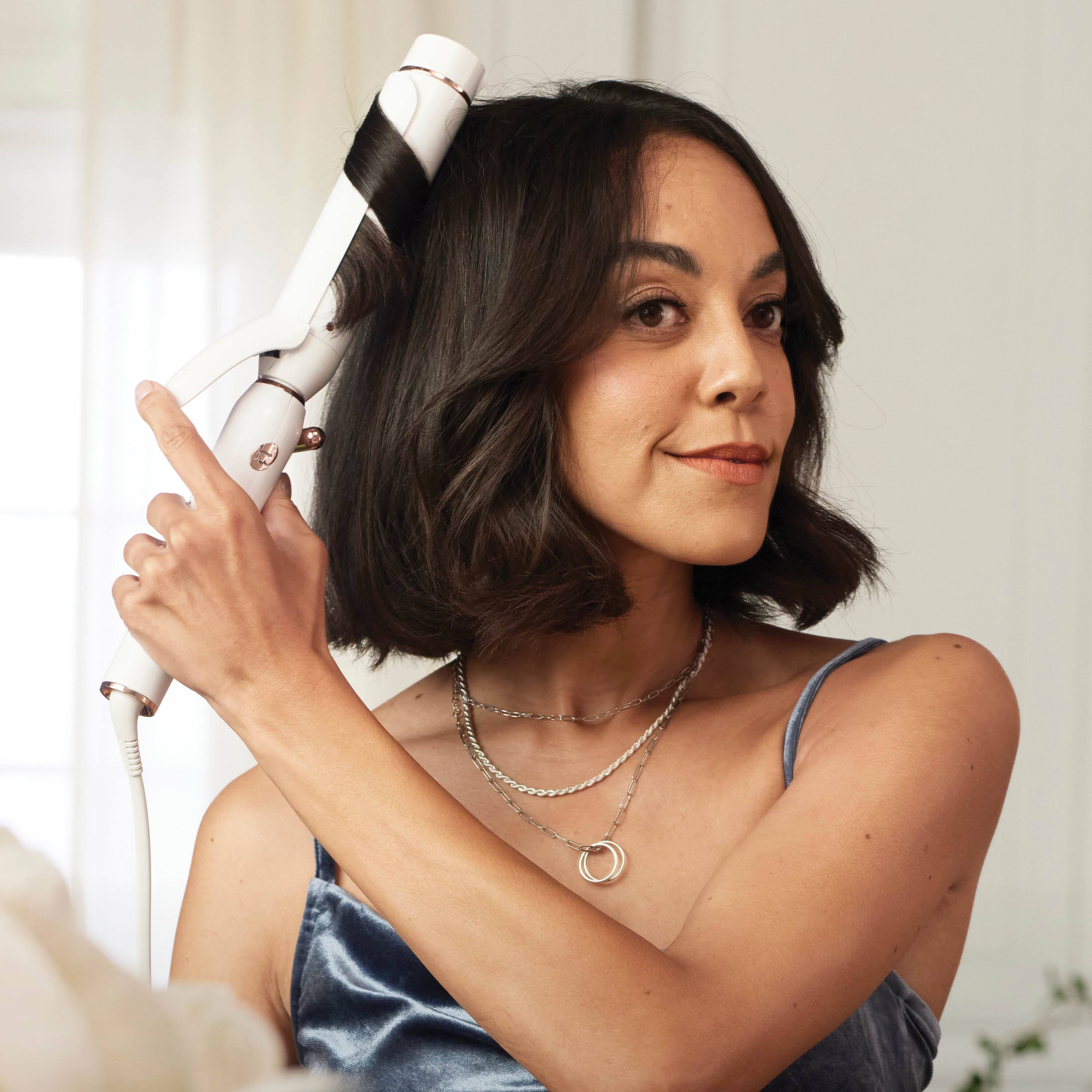 Left. T3 - T3 Switch Kit Classic Trio Interchangeable Curling Iron with 3 Barrels - White.