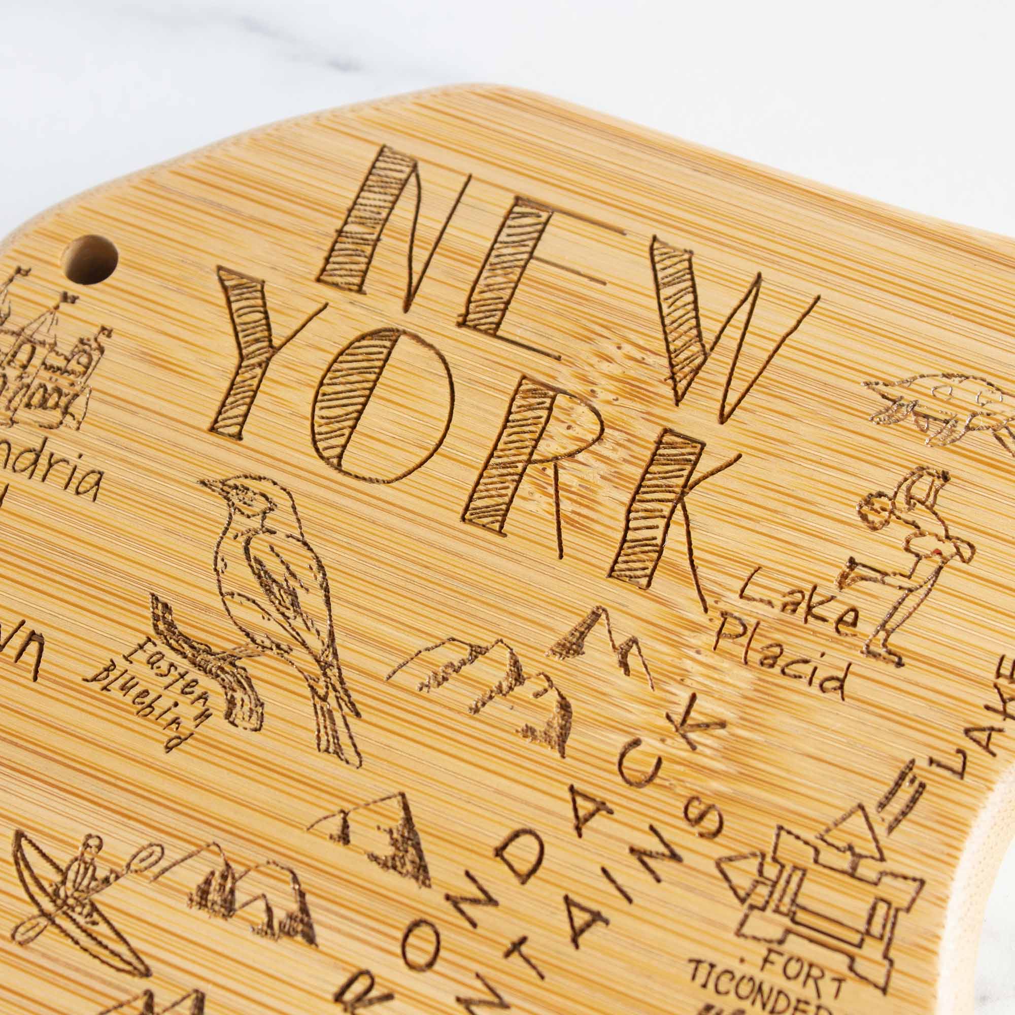 NEW YORK  
Lake Placid  
Adirondack Mountains  
Fort Ticonderoga  
Eastern Bluebird  
Lake George  
Drum