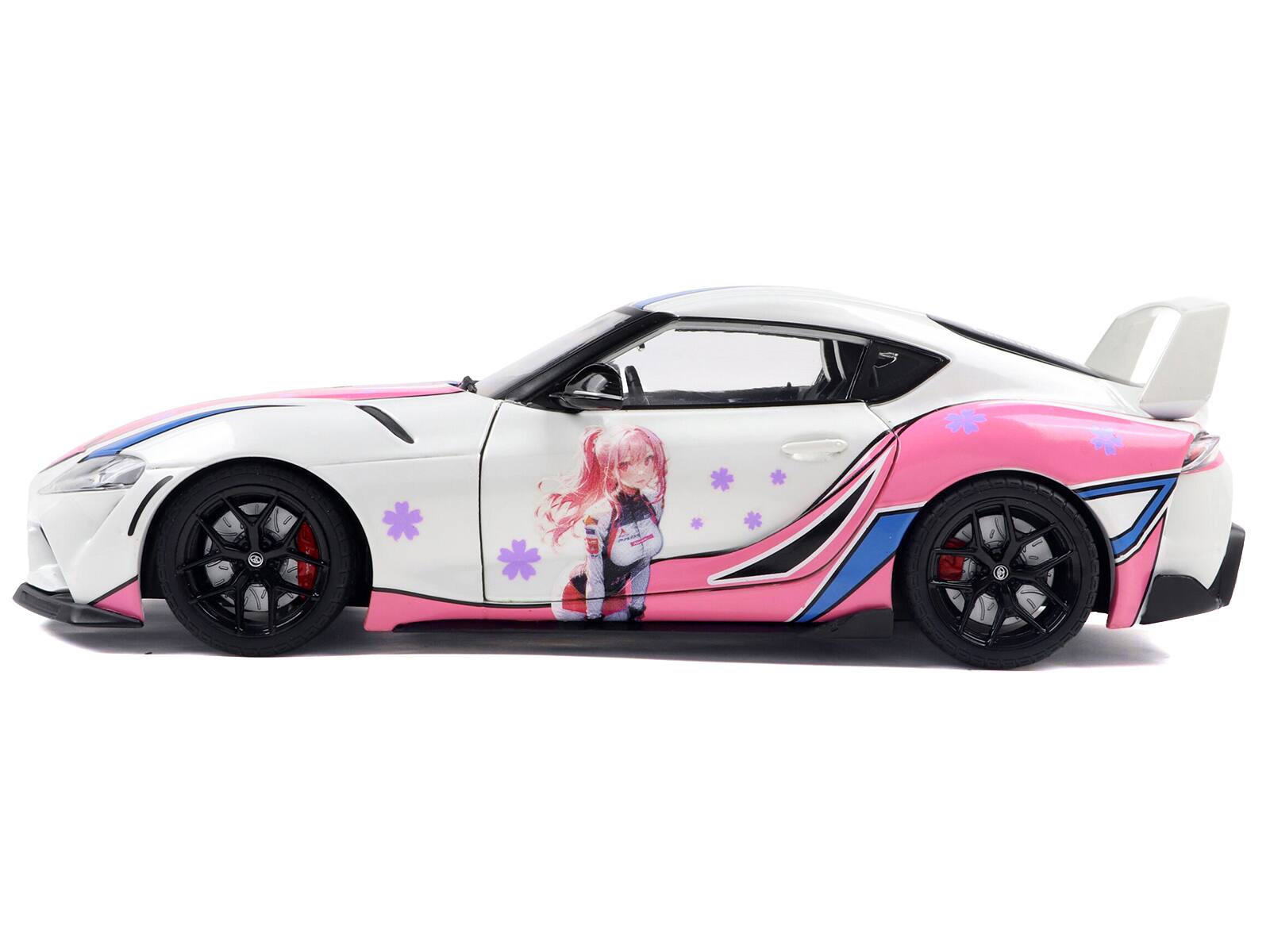 Alt View 2. Solido - 2024 Toyota GR Supra "Itasha" White with Graphics "StreetFighters" 1/18 Diecast Model Car by Solido.