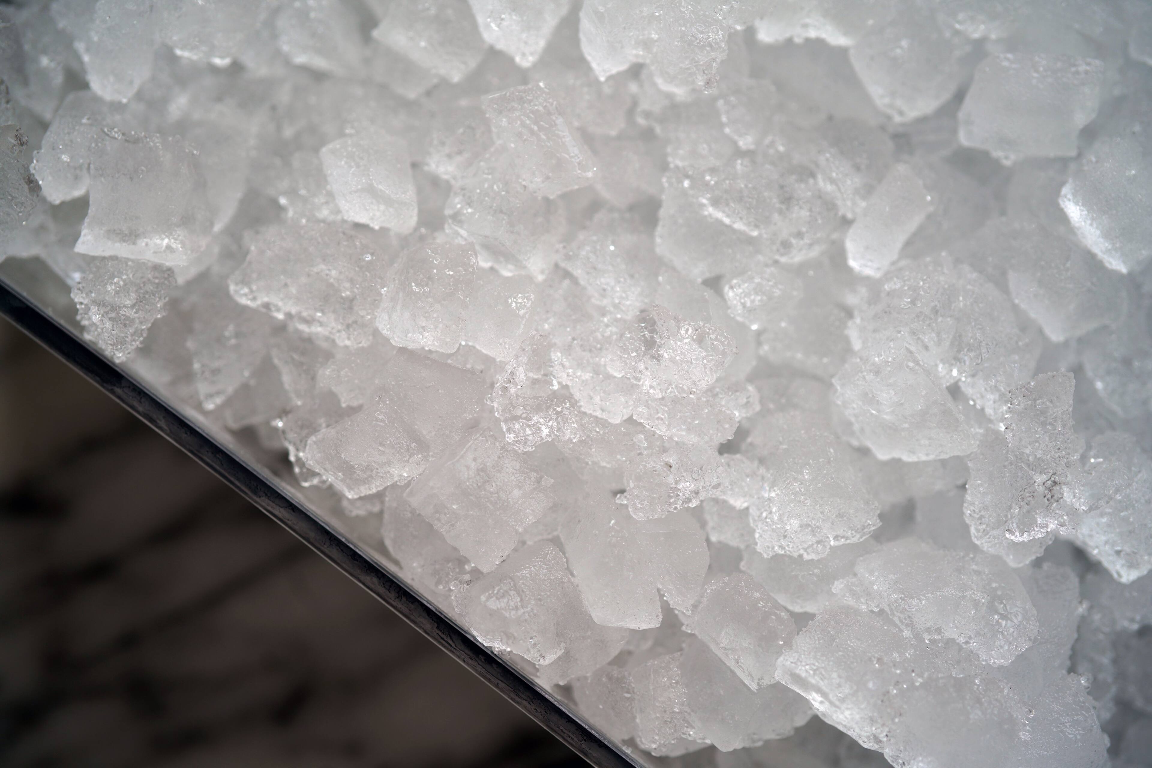 Left. U-Line - Nugget Ice 15” Pump, Concealed Soft Close Articulating Reversible Hinge, 20 minute clean cycle, Integrated Solid Door - Panel Ready.