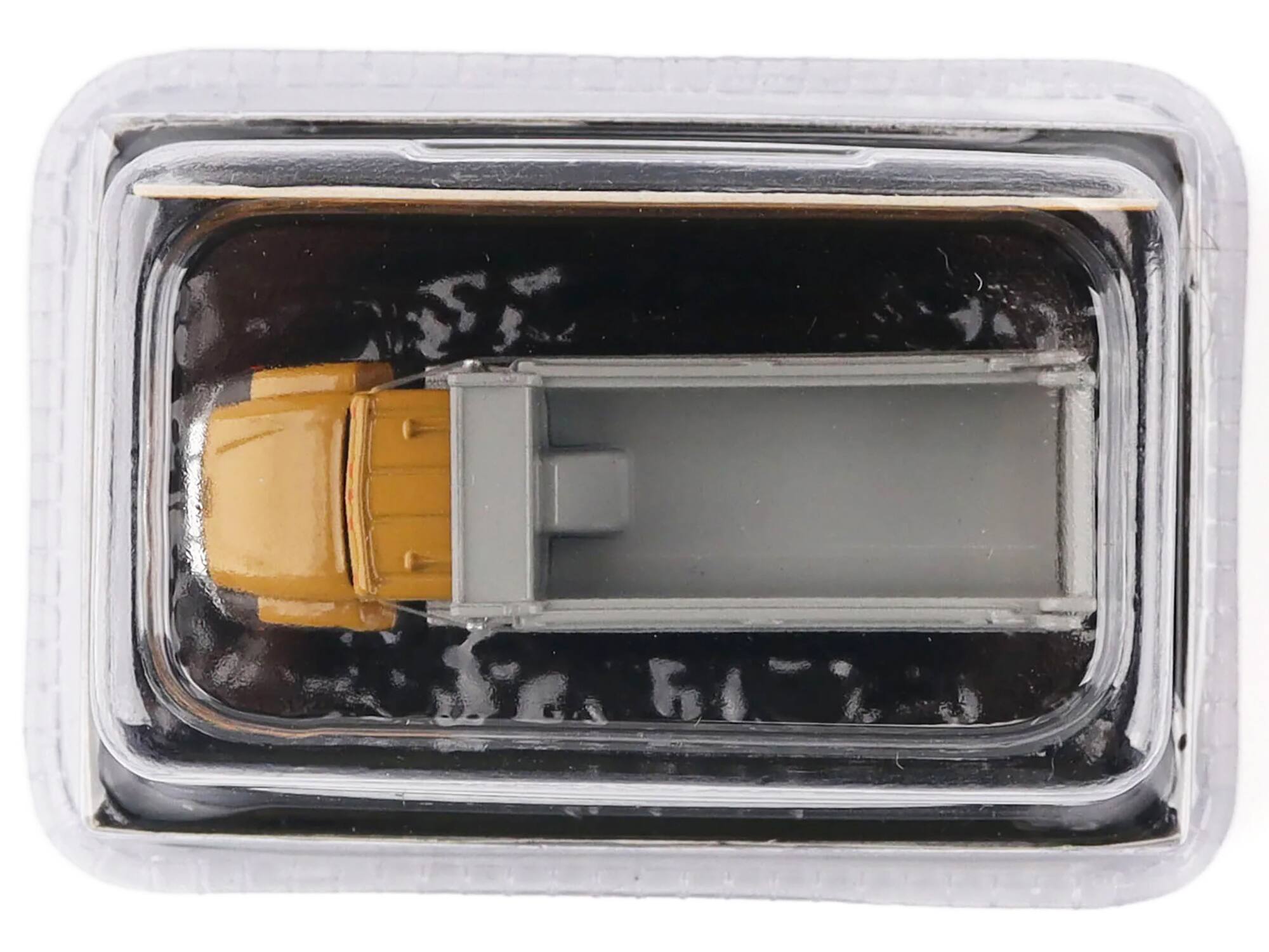 Back. Diecast Masters - CAT Caterpillar CT660 Dump Truck Yellow "Micro-Constructor" Series Diecast Model by Diecast Masters - Yellow.