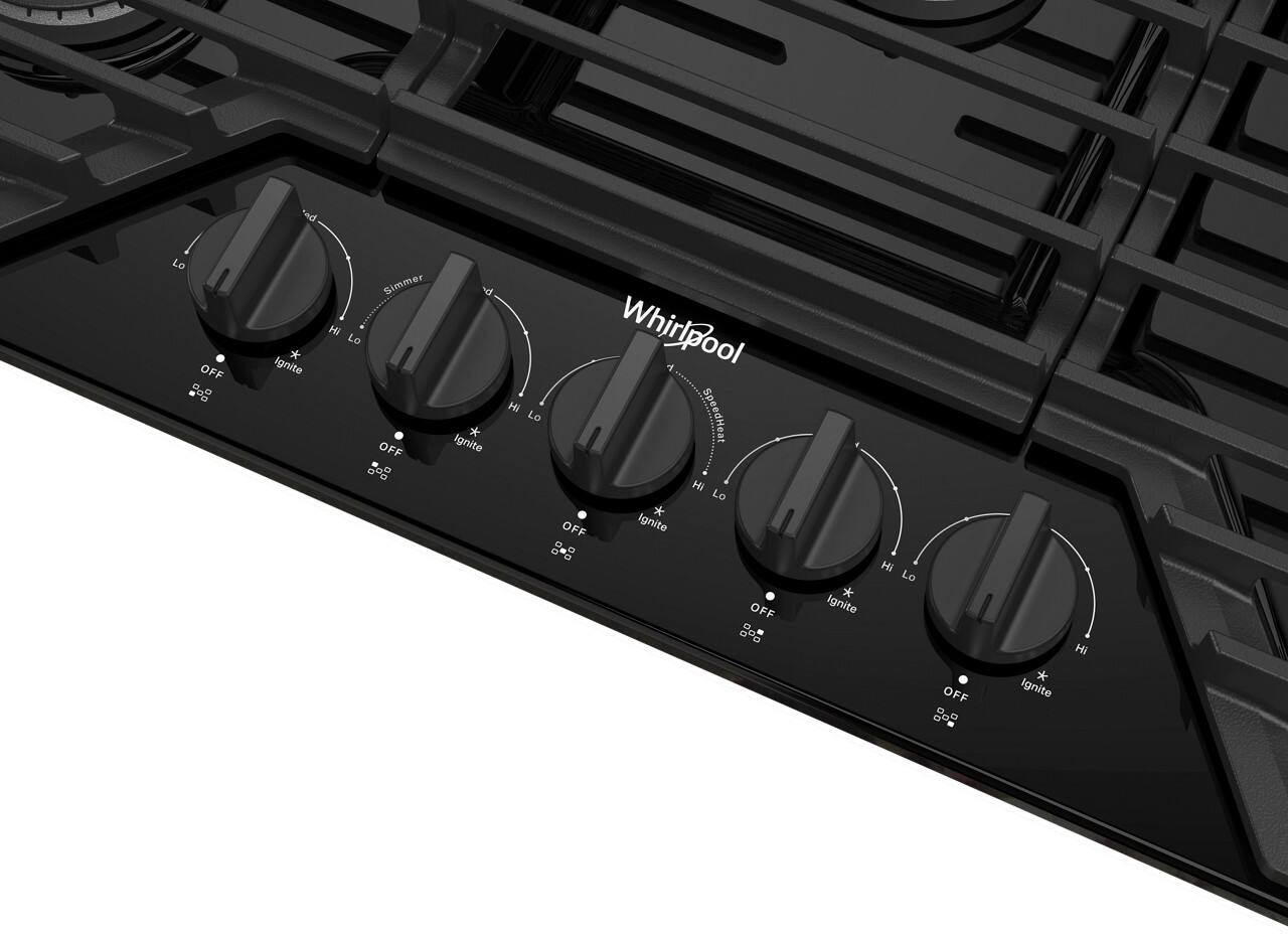 The image features a close-up view of a Whirlpool stove with a black background. The stove has a row of knobs, including a "Whirlpool" knob, and a "Hi" and "Lo" knob. The knobs are labeled with the corresponding temperature settings. The stove is likely designed for precise temperature control and easy operation.