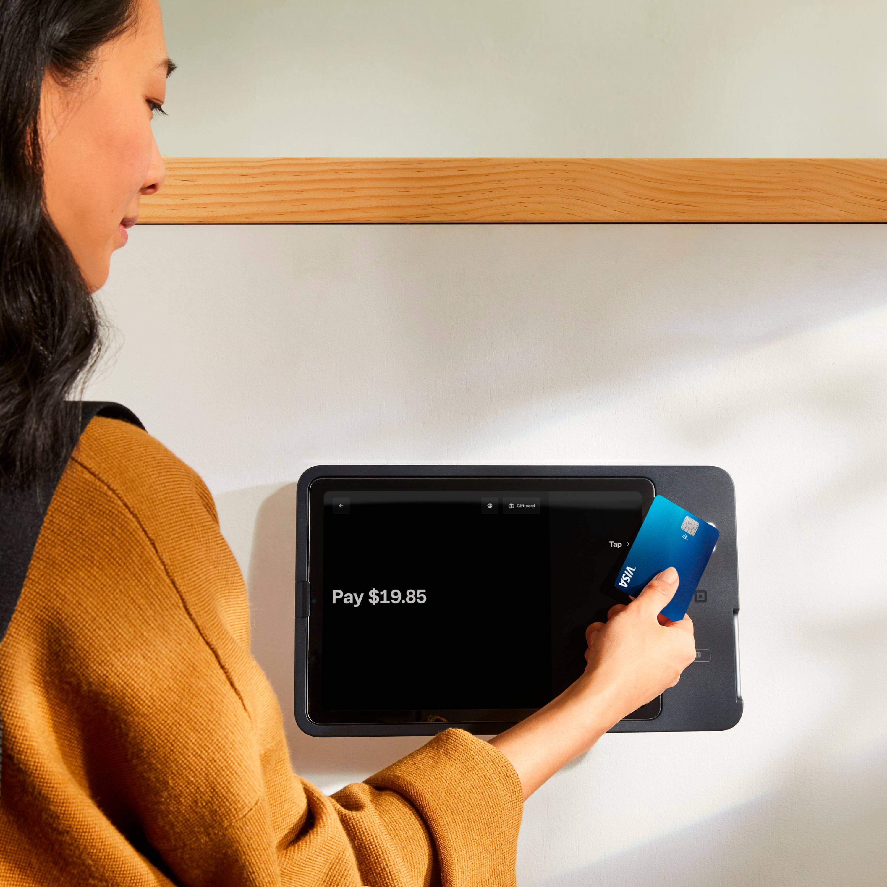 I pay $19.85. Tap VISA.