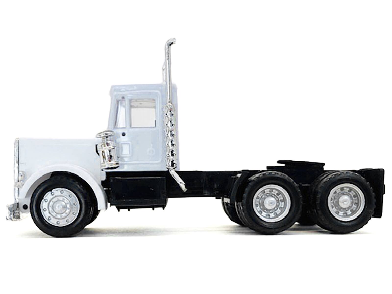 Angle. Promotex - Peterbilt Short Day Cab White 1/87 (HO) Plastic Model Car by Promotex - White.