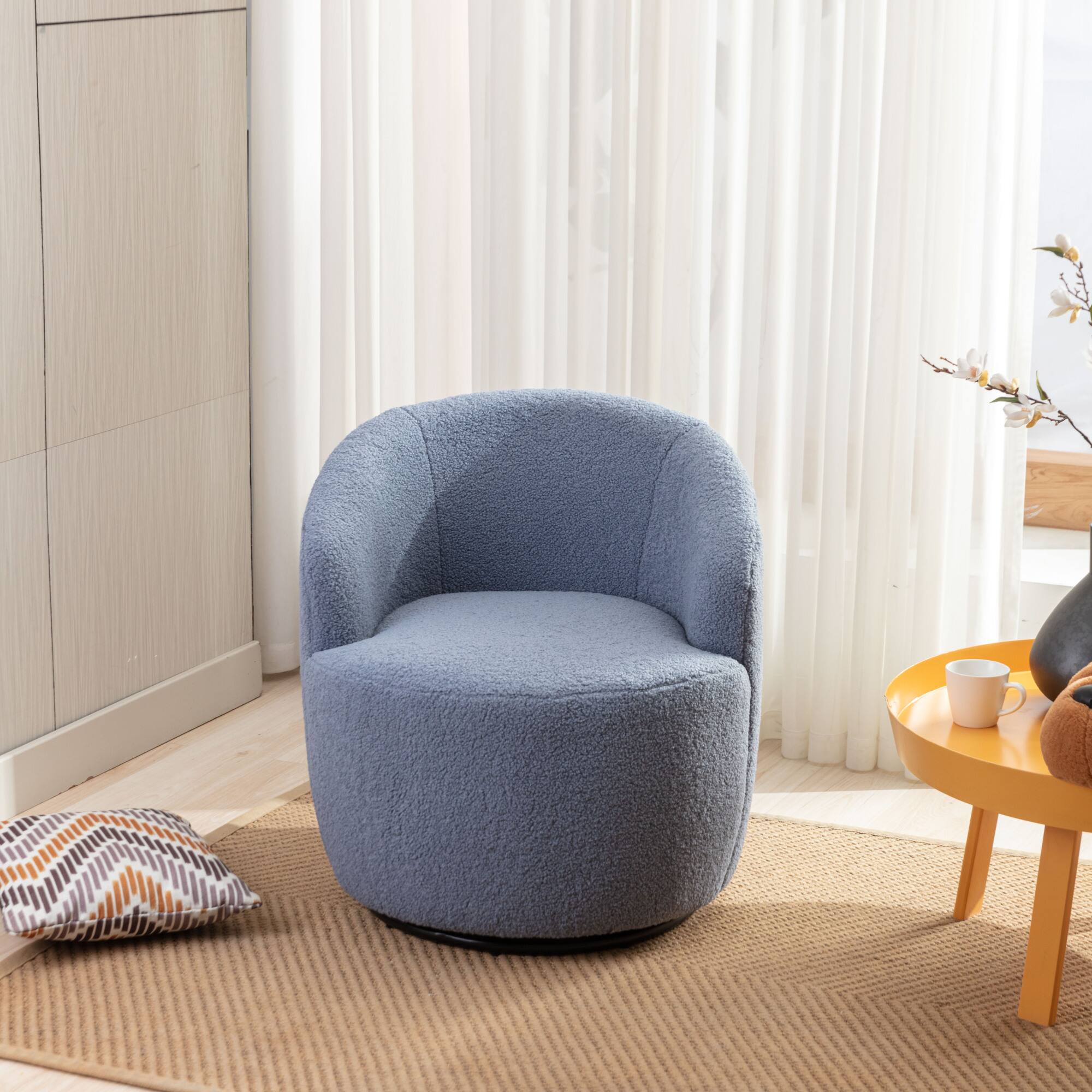 Angle. GOODSILO - Plush Swivel Accent Armchair with Ergonomic Design and 360-Degree Rotation for Modern Interiors - Light Blue.