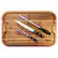The image features a wooden cutting board with three knives and a pair of tongs on it. The knives are placed in a row, with one knife being larger than the other two. The tongs are positioned next to the knives, completing the set of kitchen utensils. The cutting board is placed on a table, ready for use in the kitchen.