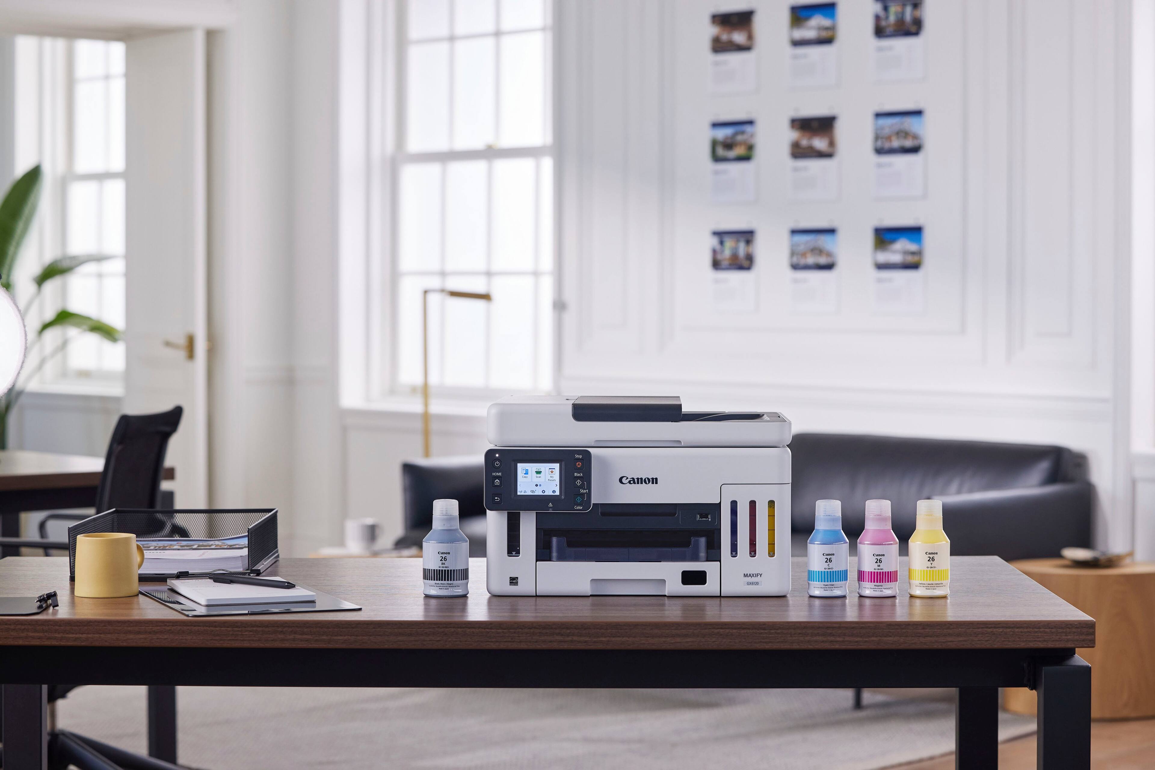 The text on the image reads: "Canon 1.5 26 26 | 2% i 26 i MALIY - I". However, it is not clear what the text is referring to or what it means. It could be related to the printer or a product description, but without further context, it is difficult to provide a correct interpretation.