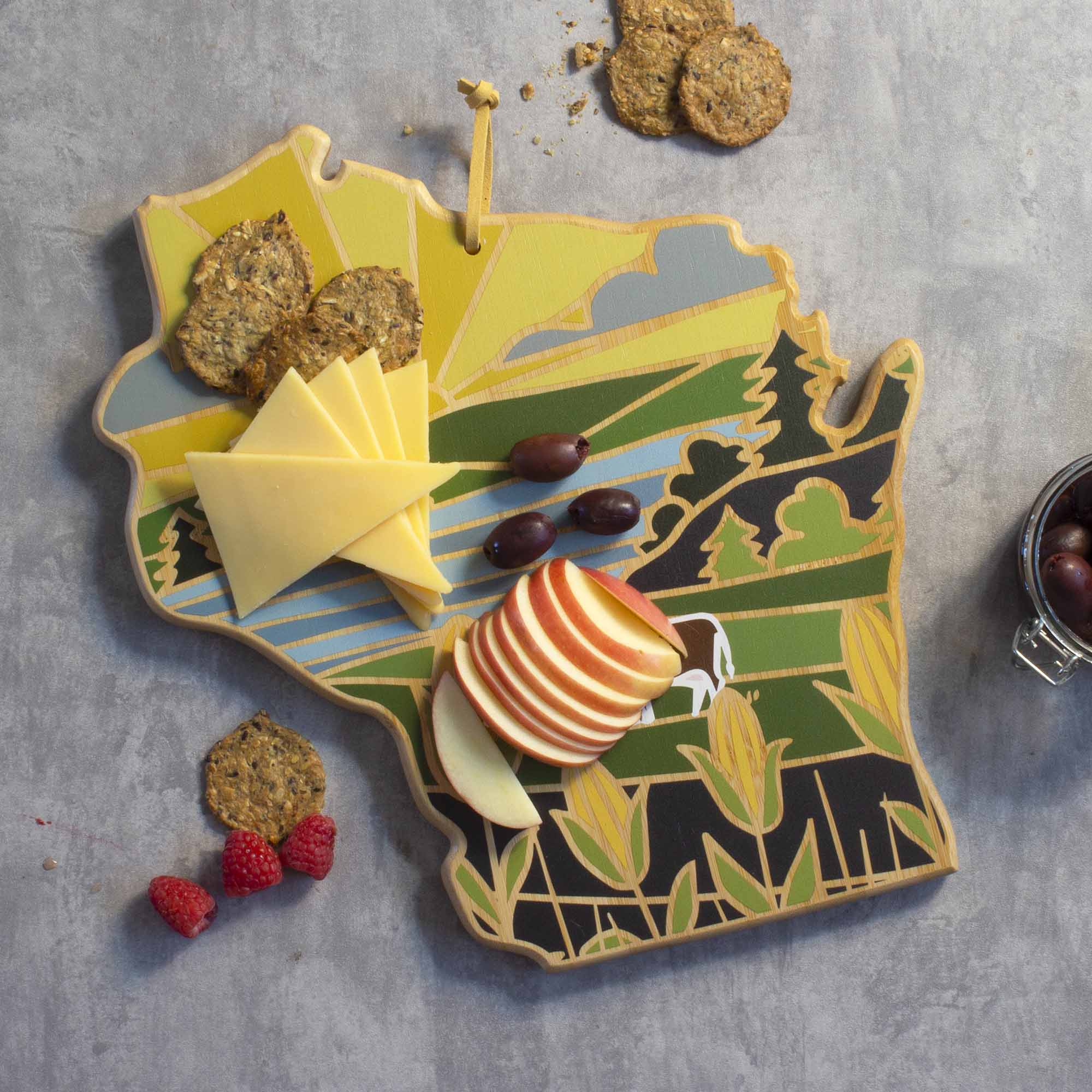 Angle. Totally Bamboo - Wisconsin Cutting Board with Artwork by Summer Stokes.