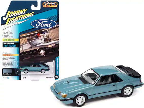 **JOHNNY LIGHTNING**
**Ford**
- DIE-CAST METAL
- BODY & CHASSIS
- AUTHENTIC FACTORY COLORS
**NEW CASTING!**
**LIMITED EDITION**
1 of 12768
**Classic Collection**
**FACTS**
- This is the first release of our new 1986 Ford Mustang SV0 casting!
- This version differs from previous Mustang SV0 releases by using the angled flush headlights rather than the recessed sealed beam version.
**3J1**
**3851**
**Light Regatta Blue**
**Version A**
**Release 2**
**6+**