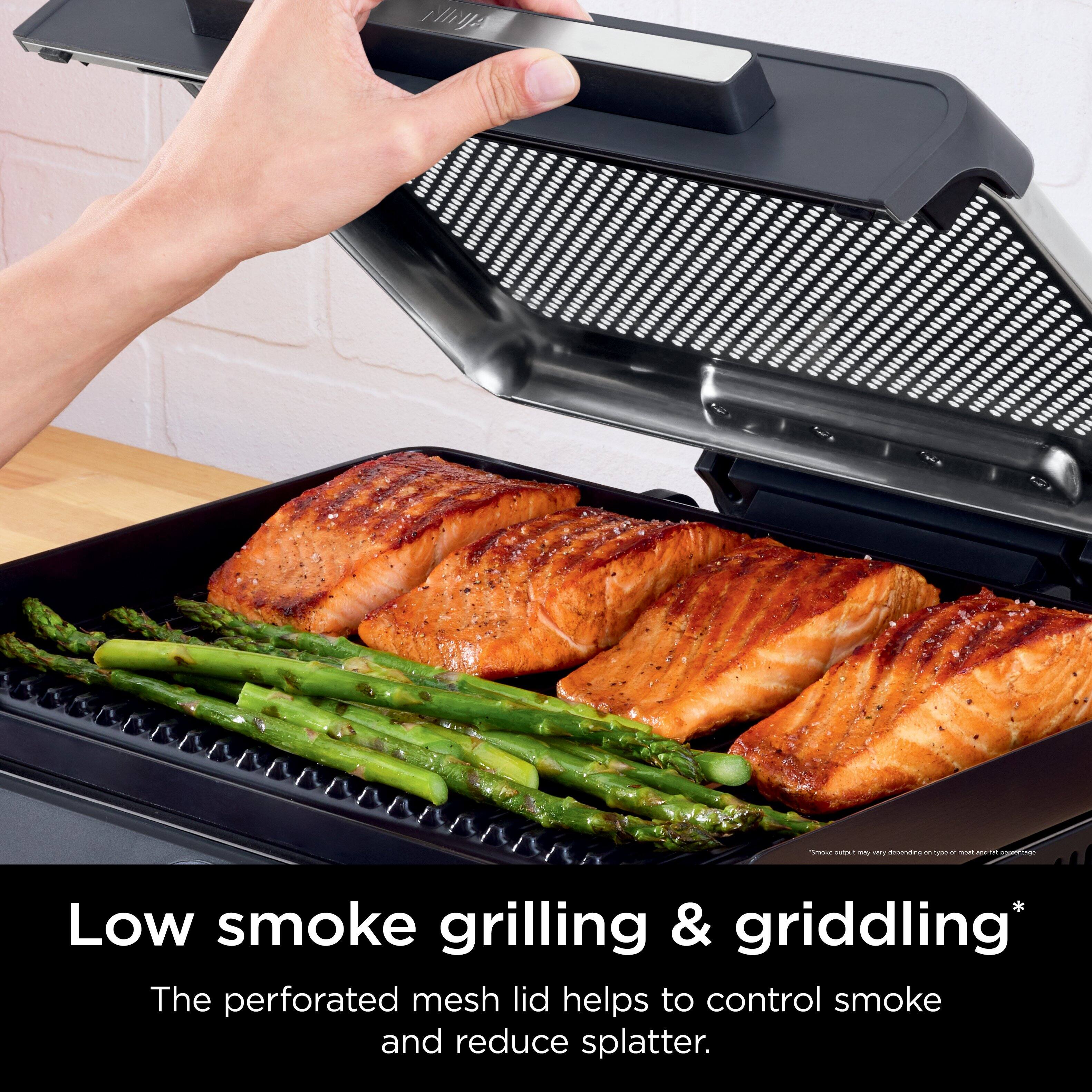 "Low Smoke Grilling & Griddling: The perforated mesh lid helps to control smoke and reduce splatter."